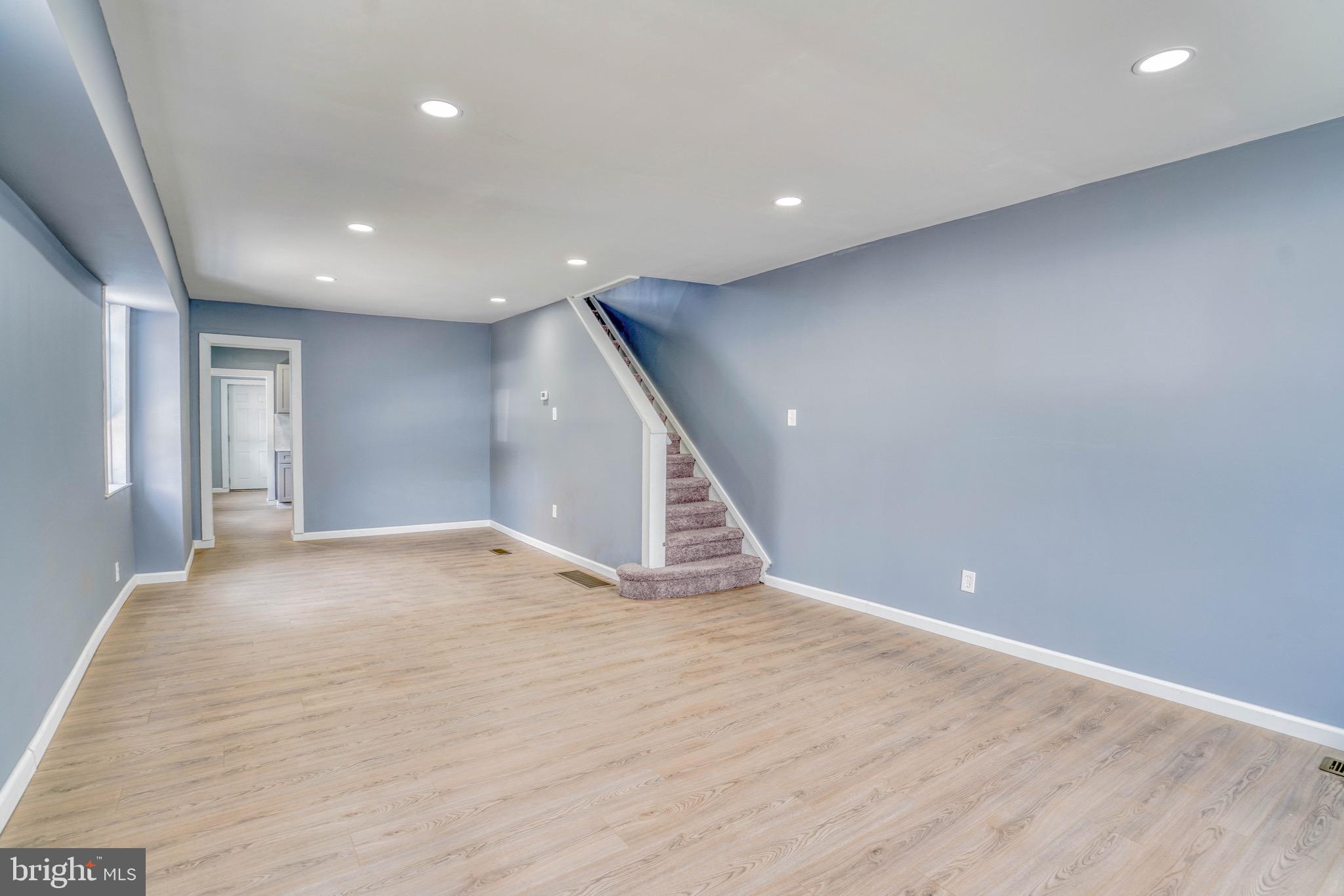 Completely Renovated 5-Bedroom End-of-Row Home! Welcome to 3601 Shawn Street, where modern updates meet spacious living. This beautifully renovated end-of-row home offers 5 bedrooms, 2 full bathrooms, and a thoughtfully redesigned interior from top to bottom. Step inside to a bright, open-concept main level featuring luxury vinyl plank flooring, recessed lighting, and a spacious living and dining area perfect for everyday living and entertaining. The stunning kitchen showcases shaker-style cabinetry, quartz countertops, stainless steel appliances, a stylish tile backsplash, and abundant cabinet space.
Both full bathrooms have been completely remodeled with designer finishes, including custom tile work, modern vanities, and contemporary fixtures. Upstairs, you'll find generously sized bedrooms with fresh paint, new carpeting, and ample closet space. The clean basement provides excellent storage and utility space with the potential for future finishing. Outside, enjoy the privacy of an end-unit location with a fenced rear yard—ideal for entertaining, pets, gardening, or relaxing outdoors. With updated finishes throughout, modern mechanicals, and a move-in ready interior, this home offers exceptional value for buyers seeking space, style, and convenience. Conveniently located near shopping, dining, schools, parks, and major highways, 3601 Shawn Street is ready to welcome its next owner.