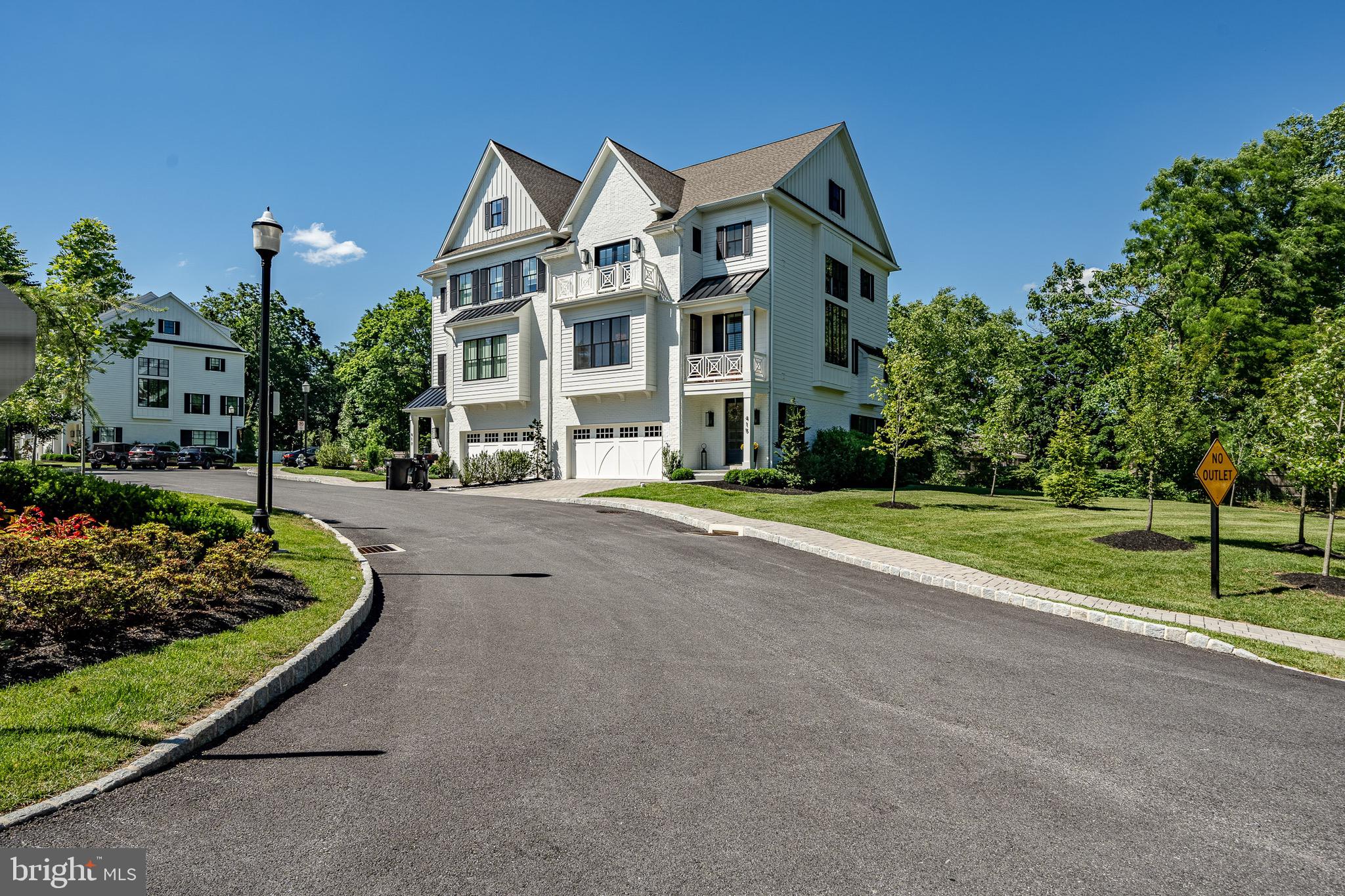 Welcome to Wayne Walk, a stunning, recently completed enclave of luxury carriage homes situated in the heart of Wayne.  Take in the picturesque views that offer private and direct access to the Radnor Trail and marvel at the surrounding open green space that is so rarely found in new communities on the Main Line.  Finely crafted by David Semerjian Builders, and expertly designed by R.A. Hoffman Architects, this exceptional townhome boasts an open and flowing floor plan that offers an abundance of natural light and 9'-10' ceilings on every floor.  7" wide plank French Oak flooring throughout.  5-stop elevator.  Fantastic outdoor balcony features that brings the incredible park views inside.  4 generously sized bedrooms, large and open gourmet kitchen and breakfast room with top-notch cabinetry, marble waterfall countertops and high-end Wolf and Sub Zero stainless steel appliances.  The masterful floor to ceiling walk-in wine room is an elegant appointment.  Large and bright family room space with gas fireplace and spacious dining room complete the main living level.  Absolutely stunning primary bedroom suite featuring 2 walk-in custom closets and a spectacular bath with large shower, soaking tub, heated towel rack, magnificent marble flooring and countertops and custom cabinetry.  Primary level En Suite bedroom boasts large and open accommodations with full bath, marble flooring and custom cabinetry.   Convenience of the laundry room is within easy access from the bedrooms.  Added finished loft space with an additional primary suite, full marble bath, custom walk-in closet, living area and kitchenette.  Entry level boasts a sharp custom wet bar with appliances. Full, unfinished basement with 9' ceilings.  2 car garage with built-ins.  Don't miss this opportunity to live in this low-maintenance community that is a short walk to downtown Wayne shopping and dining, as well as the highly rated Radnor schools and train to Center City and beyond.  Wayne Walk, where modern living and luxury combine to offer a easy, turn-key, HOA lifestyle with unprecedented open space and Radnor Trail access.  This is truly a once in a lifetime opportunity!

***This home if being offered fully furnished.  As this was the model home for the community, it has been professionally decorated and designed for the modern lifestyle.