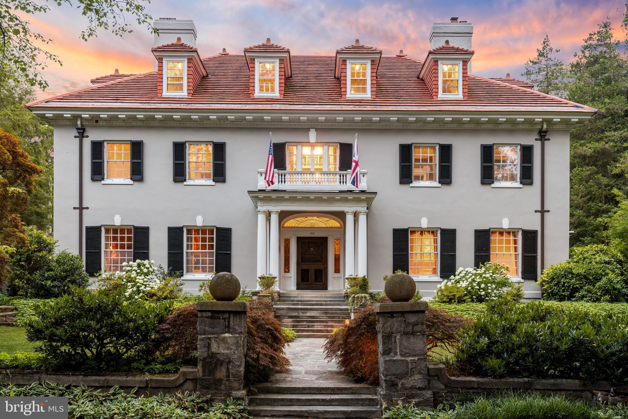 Exquisitely appointed and rich with history, this magnificent Colonial Revival, circa 1904 was originally custom built for former President of The B & O Railroad, Daniel Willard, and boasts 10,193 Square feet of unparalleled living space.  With interiors Impeccably designed by Patrick Sutton, this magnificent home has five bedrooms, five full and two half baths, a two car detached garage, and is pristinely sited on the most desired block of Goodwood Gardens in the heart of coveted Roland Park.  Soaring ceilings, detailed millwork, Mahogany doors, curved stairways,  pocket and french doors, and multiple fireplaces are just some of the original architectural details found in the elegant interior that has been impeccably updated and features an enormous dream kitchen with chef grade Viking appliances, two massive islands, a sun-drenched breakfast room and adjacent laundry room and mudroom.  Although expansive, the floor plan exudes warmth and has an easy flow from room to room beginning with a grand but welcoming foyer, an inviting living room with wood burning fireplace, a palatial dining room that is suitable to host a gathering of any size, an exceptional library, as well as a perfect for entertaining family room with a fireplace and multiple french door access to the outdoors.   The two upper levels feature a convenient media/recreation room, four generously sized bedrooms as well as a sophisticated and stylish primary suite with two separate primary baths and dressing rooms with ample closets to suit your every need.  Three wine cellars are found in the lower level, along with a game room, recreation rooms, and ample storage.   The lavish exterior boasts a fully fenced rear lawn with meticulously maintained gardens, patio and wrap around porch.   A truly exceptional home, unmatched by any other.