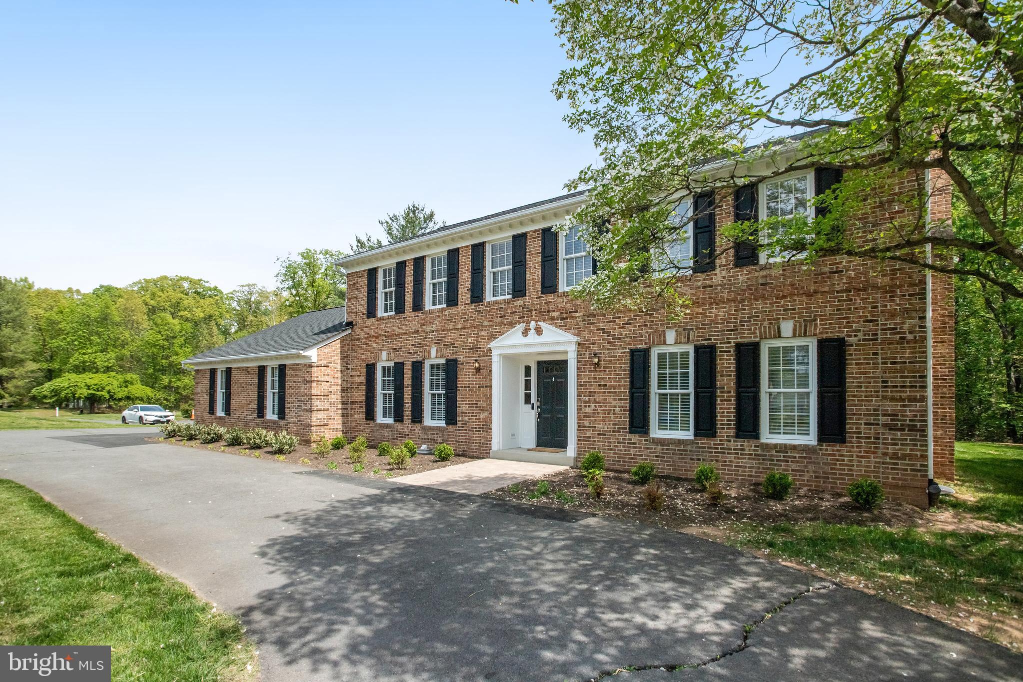 Incredible Price  for This Turn-Key Property-Gorgeous Country Estate Cited on a Private 1-Acre Homesite in Sought After Stepney Plantation-Enjoy Country Living in a Picturesque Setting with the Conveniences of a Small Neighborhood-This Gorgeous Home Includes Endless Features and Upgrades Throughout-Featuring 3 Levels with Nearly 3,500 finished Sqft-The Main Level Includes a Wide Open Floorplan Flooded with Natural Light and Hardwood Floors Throughout- You are Greeted at the Front Door by a Beautiful Staircase and Cozy Formal Spaces-A Large Living Room Makes a Great Playroom or Office/Sitting Space with It's Own Private Fireplace-At the Rear of the Home There is a Second Brick Fireplace with Custom Mantel,- The Centeroiece if the Main Level is a Gorgeous Chefs Kitchen with Convenient Bar Seating , Stainless Steel Appliances and Quartz Countertops-In Addition the Main Level Includes A Breakfast  Room, Powder Room and Large Mud/Laundry Room -The Upper Level has an Amazing Owner's Suite with a Spa-Like Owner's Bath with Upgraded Tile, Cabinets and Fixtures-The Secondary Bedrooms are Ample in Size with a Large Shared Bath-The Finished Lower Level Includes a Massive Recreation Room, Potential Bedroom 5/Den & Full Bath-Nearly Everything in This Property Has Been Updated and Replaced-Roof (2025), Pressure Tank, Top of the Line Water Filtration/Softener and Water Heater (2024)HVAC System (2023 and 2021) All Appliances (2023/2024)-Septic Tank, Distribution Box & Well Pump (2023)Blinds, Radon System and Front Landscaping (2024), Owner's Bath, Kitchen and Basement Bath Completely Renovated (2023)-The Outside is Amazing with a Huge Covered Porch & Patio, Beautiful Brick Facade and An Oversized Side Load Two Car Garage-This Property is Literally Turn Key and Just a Few Minutes from  Shopping and Restaurants and Just 10 Minutes to All of the Conveniences of Gainesville and Route 66-Incredible Value and Incredible Opportunity.