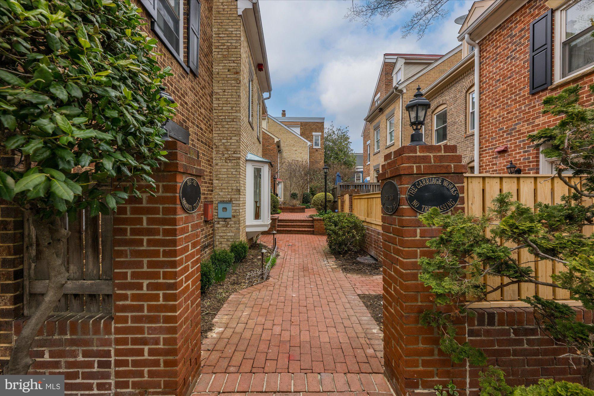 Tucked away in a beautiful and tranquil townhome community, this charming, move-in ready, three-level townhome perfectly blends style and convenience in a prime Old Town location! It features three bedrooms, one and a half baths, and an inviting open floor plan. Step inside to a warm and welcoming living room where hardwood floors and a wood-burning fireplace create a lovely ambiance. The adjoining dining room boasts French doors that open to a private brick patio, ideal for outdoor entertaining. The kitchen offers abundant cabinet space for ample storage and includes a back door leading directly to the patio.
On the upper levels, you'll discover three spacious bedrooms, a full bath, and a versatile flex room—perfect for a home office, cozy sitting area, or even a fourth bedroom. The outdoor space features a deep brick patio and off-street parking, combining charm and convenience.
Situated in one of Alexandria’s most sought-after neighborhoods, this home boasts a Walk Score of 96, placing you just steps from the Metro, Old Town's finest restaurants, boutique shopping, the Mt. Vernon Trail, and the picturesque Potomac River waterfront. Don’t miss the opportunity to own a beautifully updated townhome in an unbeatable location! Welcome home!
