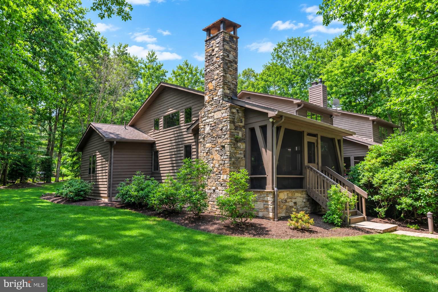 A rare opportunity to  own a lakefront property in the Blakeslee.  Located in one of best coves and communities on Deep Creek Lake, the 4 bedroom, 3.5 bath property offers the perfect home and lot package for the best in lakefront living.    

The 1+ acre wooded property with 150' of premium frontage was the first building site purchased when the development opened .  The gently sloping wooded sunset facing lot provides easy access to the lake and dock areas.  The current owners have added multiple landscape upgrades including paver stone walkways along with lakeside picnic and fire pit areas.    A paved circular driveway provides easy year round access from the street.  

With lake and summer sunset views from nearly every room,  the well designed home offers an open floor plan featuring plenty of window coverage.  The main level offers a recently upgraded kitchen and lake facing eating area.   A large lake facing great room with fireplace adjoins a cozy family room with its own fireplace and direct deck access.  The recently added primary bedroom suite includes a spacious bedroom, luxurious bath, 2 walk in closets and a bonus room currently used as an office.  The second floor includes a second primary suite and two spacious bedrooms along with a loft.    There is also a lower level with a room that could be a game and or work out area.     

Many would consider the recently added lakeside covered porch with impressive wood fireplace their favorite spot.  It offers direct access to the new deck and primary suite.   

The property also offers an attached 2 car garage and a detached 24 x 24 garage with plenty of interior height for boat and or tall vehicle storage.    Additional upgrades and features includes the addition of a  detached 2 car garage, complete deck replacement, whole house generator, replacement and updated  HVAC and security systems.   The roof shingles have also been recently replaced .  

Blakeslee is considered by many to be the finest community in the Deep Creek Lake area.  The developers believed quality was more important than quantity and designed a community with great amenities and over 100 acres of open space that is restricted from additional development.   Blakeslee has also attracted a healthy mixture of full time and vacation owners.   The self managed community offers many unique amenities.   These amenities include a community center with indoor heated pool, locker rooms, kitchen and decking.   Two tennis courts along with a basketball and pickleball courts are well maintained .  A multipurpose field is available for outdoor games.  A trail system runs through the wooded areas for area residents.  Other important features include a storage areas for boats and trailers along with a dedicated trash removal area.  

It all adds up to a a great opportunity to experience all the benefits that home ownership in the Deep Creek Lake area has to offer.  Schedule your showing today as homes for sale in this community typically don't last long.