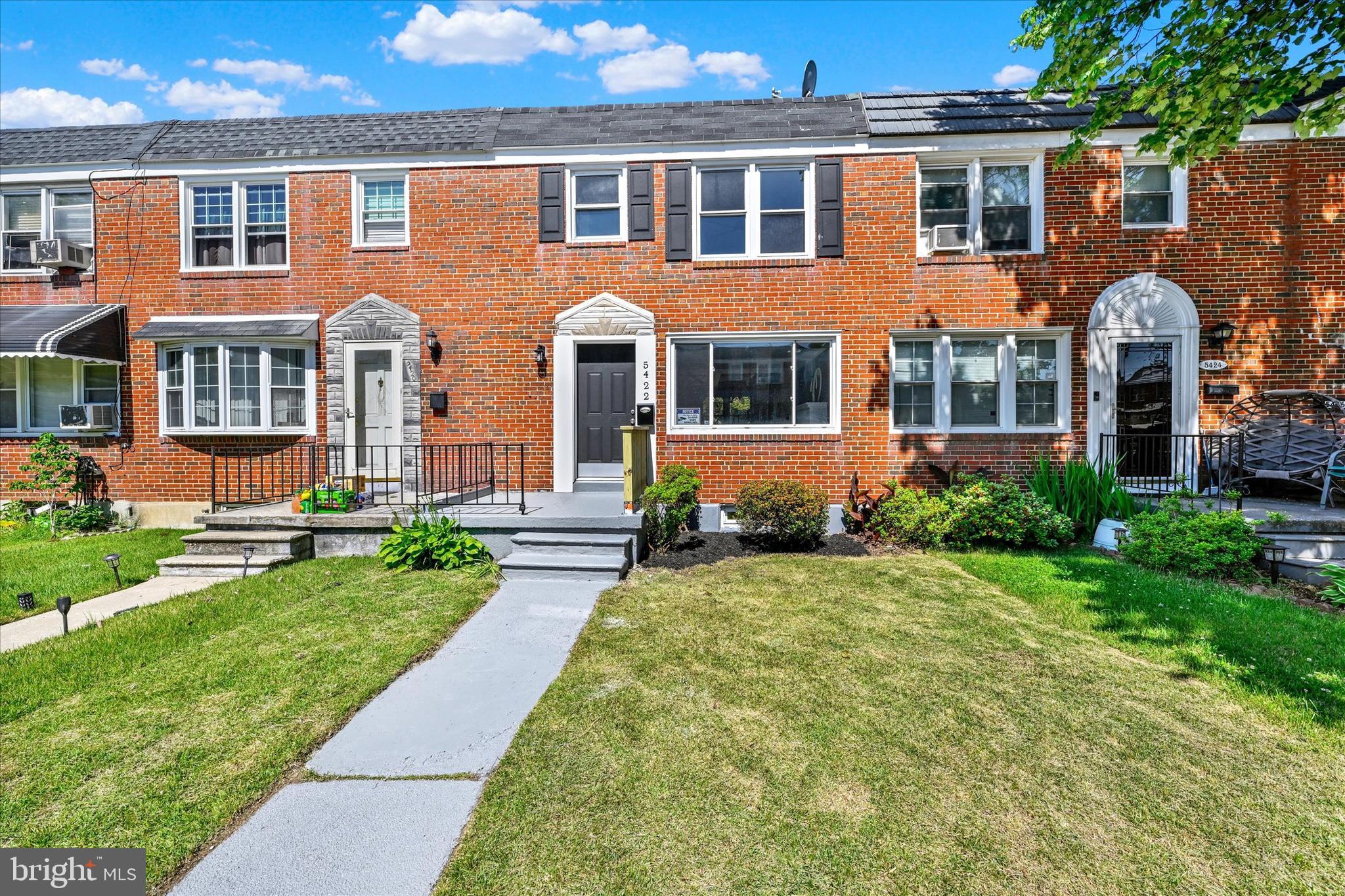 Welcome to 5422 Bucknell Road, a beautifully renovated interior townhome offering stylish updates and comfortable living throughout. Step inside to a bright and inviting living room featuring a large bay window that fills the space with natural light and a striking black brick accent wall that adds character and charm. Property has updated windows and HVAC.

The dining room showcases elegant tray ceilings, creating the perfect setting for everyday meals and entertaining guests. The updated kitchen is sure to impress with white cabinetry, a classic white subway tile backsplash, and stainless steel appliances, blending timeless design with modern convenience.

Upstairs, you'll find three spacious bedrooms and a beautifully updated full bathroom. The fully finished lower level provides valuable additional living space with a versatile recreation room, a dedicated laundry area, and a second full bathroom, ideal for guests, a home office, or a media room.

Outside, enjoy the rear patio area, perfect for relaxing or hosting gatherings, along with the convenience of a private parking pad. With thoughtful renovations throughout and move-in-ready appeal, this home is an excellent opportunity to enjoy comfortable city living.