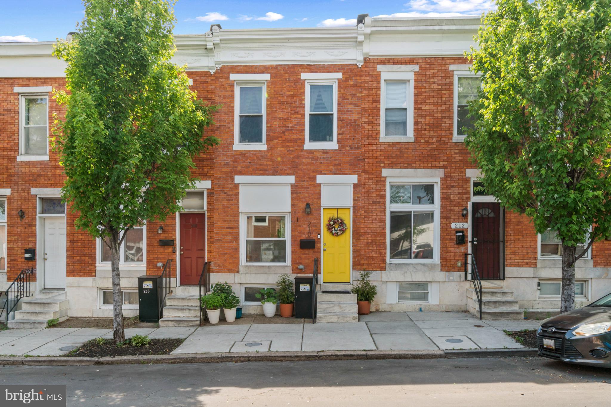 Welcome to this beautifully renovated row home in the vibrant Patterson Park neighborhood! Completely renovated in 2023, this stunning residence offers the perfect blend of modern luxury and city convenience. Step inside to an open-concept main level featuring a spacious living area that flows seamlessly into a stunning kitchen complete with a breakfast bar, quartz countertops, stainless steel appliances, and abundant cabinetry for all your storage needs. Upstairs, you’ll find two generously sized bedrooms, each with its own private ensuite bathroom featuring sleek walk-in showers. A gorgeous skylight fills the upper hallway with natural light, creating a warm and airy atmosphere throughout the second level. The fully finished lower level offers exceptional additional living space with impressive ceiling height, a full bathroom, and a versatile bonus room perfect for a guest suite, home office, gym, or playroom. Enjoy relaxing mornings or entertaining evenings on the inviting rear patio; an ideal outdoor retreat right at home. Conveniently located just steps from Patterson Park and within walking distance to Johns Hopkins, this home offers the best of city living with style, comfort, and accessibility. Come see for yourself why this exceptional home is the perfect place to call your own!