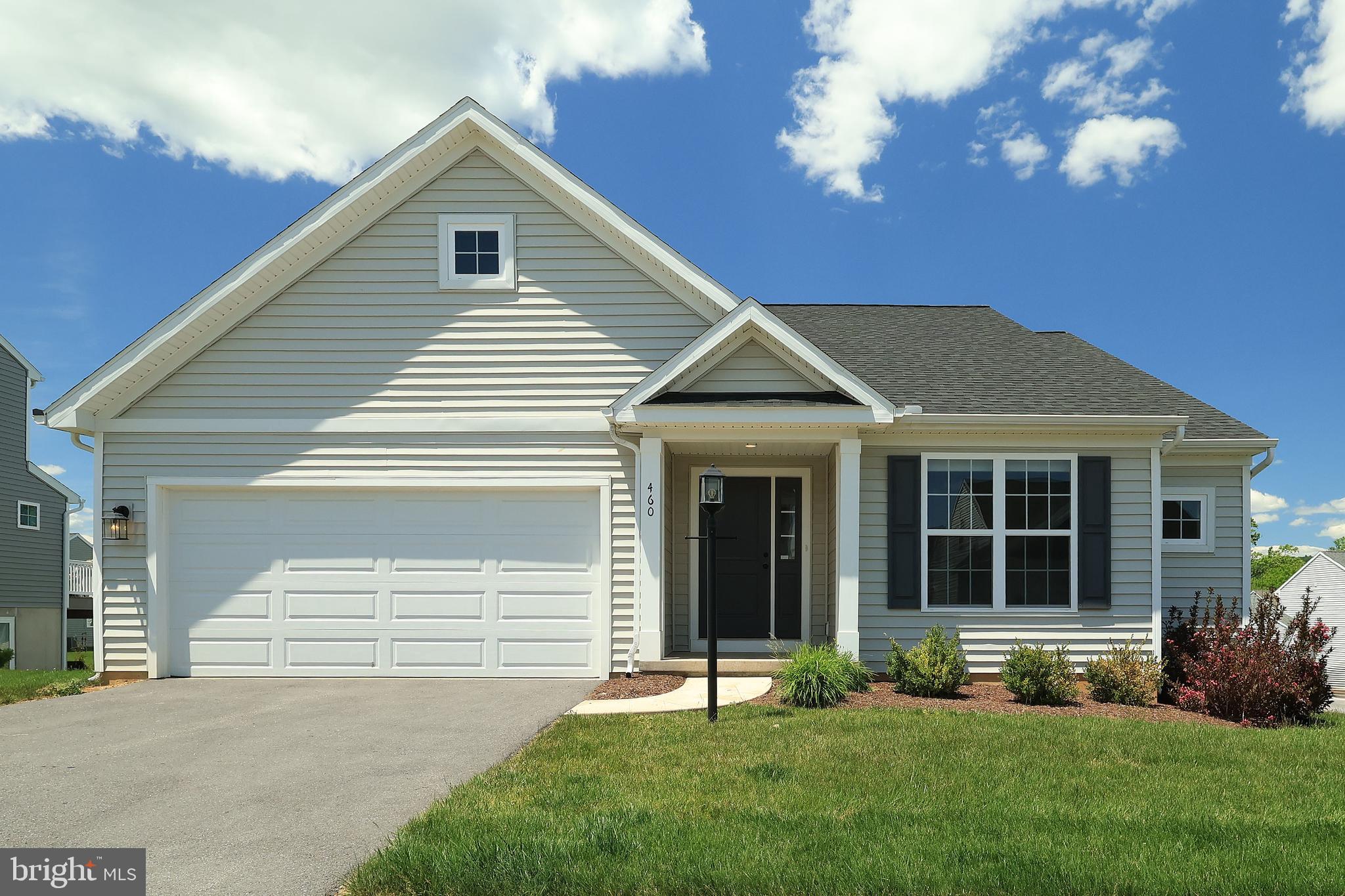 OPEN HOUSE - Thursday, June 4th , 4:30 - 6:00 PM. Welcome to this pristine 2022-built ranch nestled on a desirable corner lot in Nittany Glen. With 1,782 square feet of thoughtfully designed living space, this lightly lived-in gem offers 3 bedrooms, 2 bathrooms, and one floor living! The modern kitchen and living room open seamlessly into the sun-drenched morning room addition. The deck awes with stunning views — perfect for morning coffee or evening entertaining. Custom honeycomb blinds add a refined touch throughout, while a whole-home generator with transferable service plan ensures peace of mind in every season. The expansive walkout basement with plumbing rough-ins offers incredible potential for recreation, a home gym, or future finishing. Beyond your front door, the community truly delivers. Enjoy a maintenance-free lifestyle with snow removal and lawn mowing all taken care of for you. Spend your free time at the community clubhouse or take a dip in the community pool. Close to Beaver Stadium, Toftrees Golf Resort, and State College Regional Airport, this home brings the best of State College to your doorstep! Every detail has been carefully considered in this move-in-ready retreat — a rare opportunity to own a nearly new home without the wait!