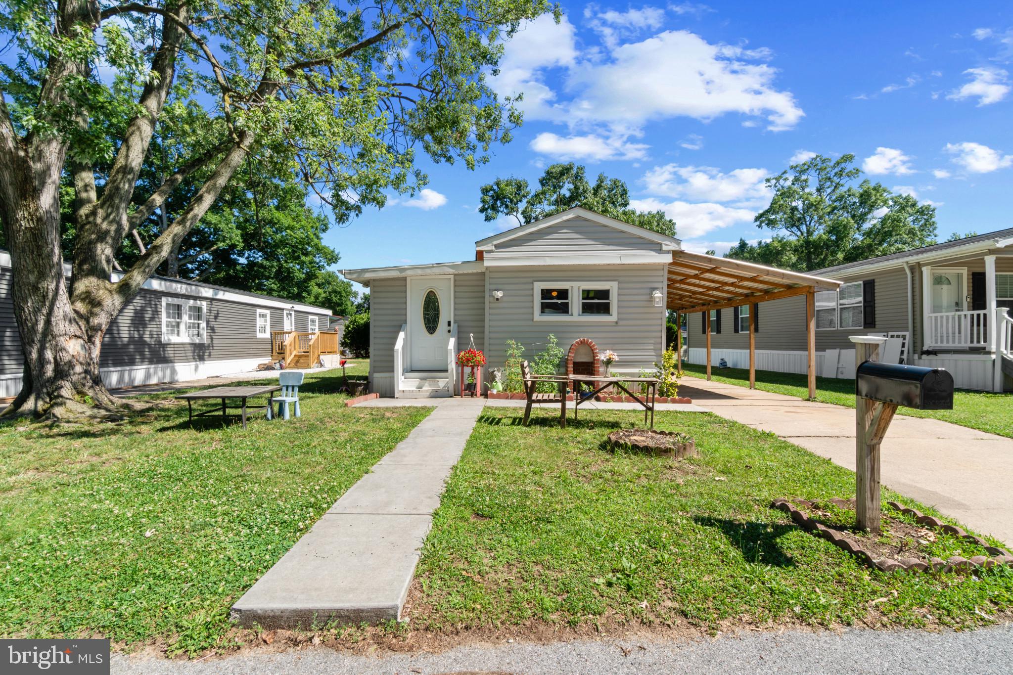Welcome home to a beautifully updated three-bedroom, 1.5-bath mobile home where modern comfort meets community living. Inside,  luxury vinyl plank flooring flows through an open layout anchored by an updated chef's kitchen with updated appliances. A custom structural addition expands your living space, giving you a spacious third bedroom and a massive walk-in pantry. Everyday conveniences abound, from the in-unit washer and dryer to energy-efficient mini-splits that provide customizable, room-by-room heating and cooling. Remodeled in 2002. Complete with a new roof and water heater is 5 years old. Step outside to enjoy wonderful park amenities including a dog park, playground, and private party room. All that is missing is you. Buyers must have park approval in advance to submitting an offer.