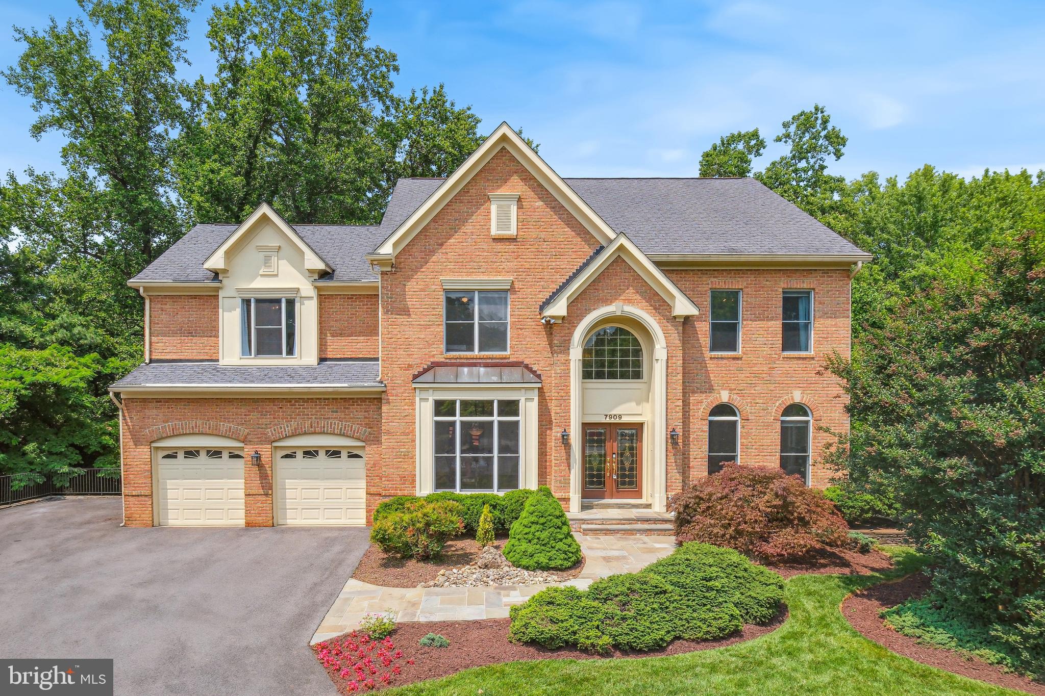 *******NEW AMAZING PRICE********
Nestled on a quiet cul-de-sac with top rated schools (Walking distance to Walt Whitman, Pyle Middle School, and Burning Tree Elementary) and this price is below the purchase amount! 

Welcome to 7909 Paloma Court located in sought-after West Bethesda Park, this stunning 5-bedroom, 4.5-bath residence offers the perfect blend of comfort, elegance, and functionality.

Step inside to discover beautifully crafted interiors featuring gleaming hardwood floors, detailed crown molding, and oversized windows that fill each room with natural light and picturesque views.

At the heart of the home is a newly renovated kitchen designed to impress. It features Quartz countertops, custom cabinetry, stainless steel appliances—including a Sub-Zero refrigerator and a double oven—and a spacious eat-in area that opens directly to the expansive deck. Perfect for entertaining, the deck comes equipped with a built-in grill and overlooks a serene, tree-lined backdrop.

Just off the kitchen, the main living space offers warmth and sophistication with a fireplace and more panoramic windows. This level also features a dedicated office, formal dining room, formal living room, and a convenient half-bath—ideal for both everyday living and entertaining guests.

Upstairs, the expansive primary suite is a private retreat, complete with a sitting area and a second fireplace. The bedroom is surrounded by windows, creating a peaceful and airy atmosphere. The spa-like primary bath offers a soaking tub, a separate shower, double vanities, and ample storage. The impressive walk-in closet features custom built-ins and a center island. Three additional spacious bedrooms, two full baths, and a conveniently located laundry room complete the upper level.

The finished walk-out basement adds even more living space with a large family room, game area, and extensive kitchenette—perfect for guests or entertaining. A full bathroom and a spacious fifth bedroom with its own sitting area and built-in cabinetry provide flexible options for multi-generational living or hosting. Additional storage space is abundant on this level.

Outside, the beautifully landscaped yard connects to a walking path and offers easy access to community amenities, including an open field, basketball court, and tennis courts—creating a perfect balance of privacy and connection.

Situated in the highly desirable West Bethesda Park, this home offers a rare combination of privacy and convenience. Residents enjoy easy access to nearby parks, walking trails, and neighborhood amenities, including a large open field, basketball court, and tennis courts. Highly rated schools, with a private walking path to Pyle middle school through the back yard. Just minutes away are the shops and restaurants of downtown Bethesda, Pike & Rose, Wildwood Shopping Center, and Montgomery Mall. Commuters benefit from proximity to I-270, I-495, and the Bethesda Metro station, providing quick access to downtown Washington, DC, and major employment centers. This is a rare opportunity to enjoy privacy, convenience, and an exceptional lifestyle in one of Bethesda’s most desirable neighborhoods.