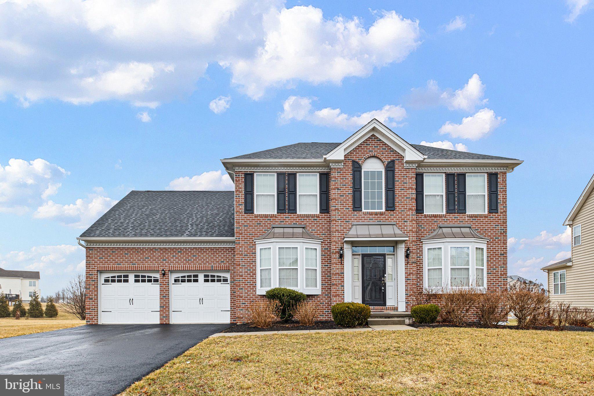 Welcome to 1224 Caitlin Way in quiet yet convenient High Point at St. Georges.  The neighborhood features well manicured lawns, wide streets, a pool, club house, and more.  Pull into your large freshly paved driveway and make your way inside.  Entering the home you will be greeted by gleaming wood floors, high ceilings, and abundant natural light.  The large family room could double as in home office, with bay windows overlooking the front yard.  The home features and open concept living room family room.  The kitchen has been furnished with gleaming granite countertops and new cabinets.  There is rear access to the back yard via sliding glass doors.  Off the kitchen you will find a dedicated main floor laundry room and access to your two car garage.   The dining room offers plenty of room for entertaining.  The main level also features a powder room.  Make your way downstairs and check out the finished basement!  The basement offers an additional 1000 sqft of finished living space with egress, including a stylishly done granite bar with wine fridge and stone backsplash.  A full bath is also in the basement.   Upstairs you will find four bedrooms and two full baths.   The spacious main bedroom offers its own private bath and walk in closets.  Schedule a tour today!