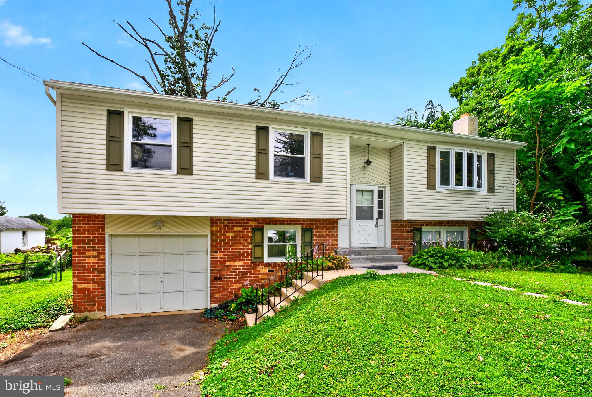 Welcome to this 4-bedroom, 2.5-bath home offering plenty of space, a functional layout, and an oversized backyard with endless possibilities. The master bedroom features an en suite bath, and many of the home's major systems have been updated in recent years, giving buyers added peace of mind.

With the major improvements already completed, this home is ready for its next owner to add their own style and make it their own. A little updating will go a long way in bringing out its full potential. Being sold as-is, this is a fantastic opportunity to own a home with great bones, valuable updates, and plenty of room to make it your own.