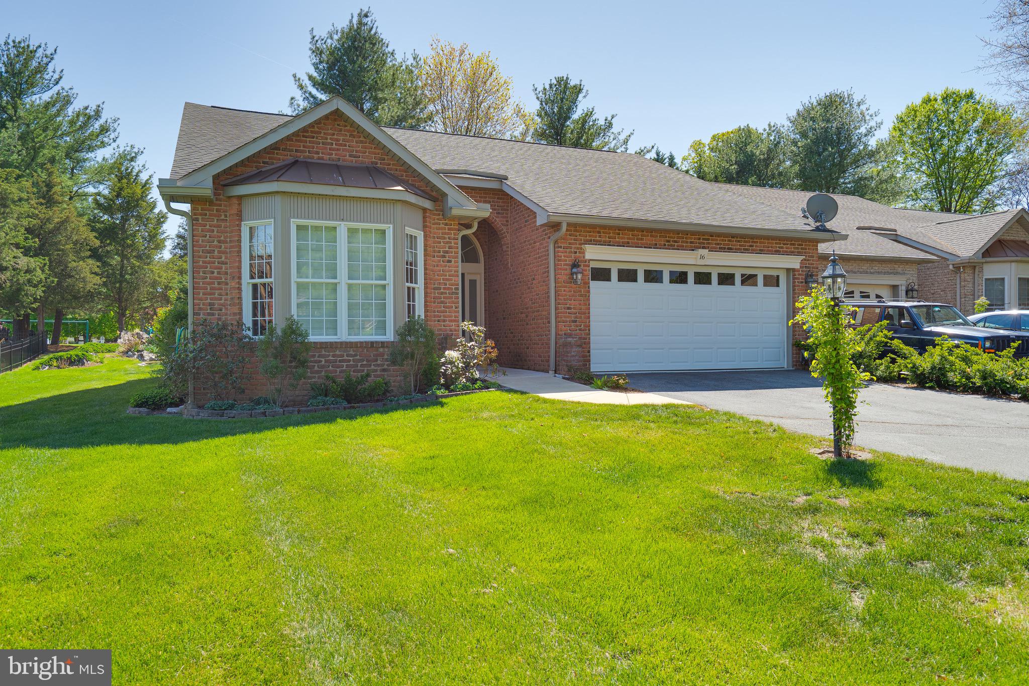 Stunning 2BR/2BA All-Brick Villa – Spring Mills, Falling Waters, WV

Beautifully updated 1,532 square foot 1-story end unit villa with vaulted ceilings, wood floors throughout, and a cozy wood-burning fireplace. Features include an upgraded kitchen and baths, all high-end appliances (washer/dryer included), 14 x6 foot primary bath plus walk in closet and a spacious 2-car garage. Too many upgrades to list - see pictures.  Enjoy outdoor living on the rear deck and convenience of a paved driveway.  Located in Spring Mills subdivision with community pool, tennis courts, playground & walking trails. Easy access to I-81 (Exit 20).