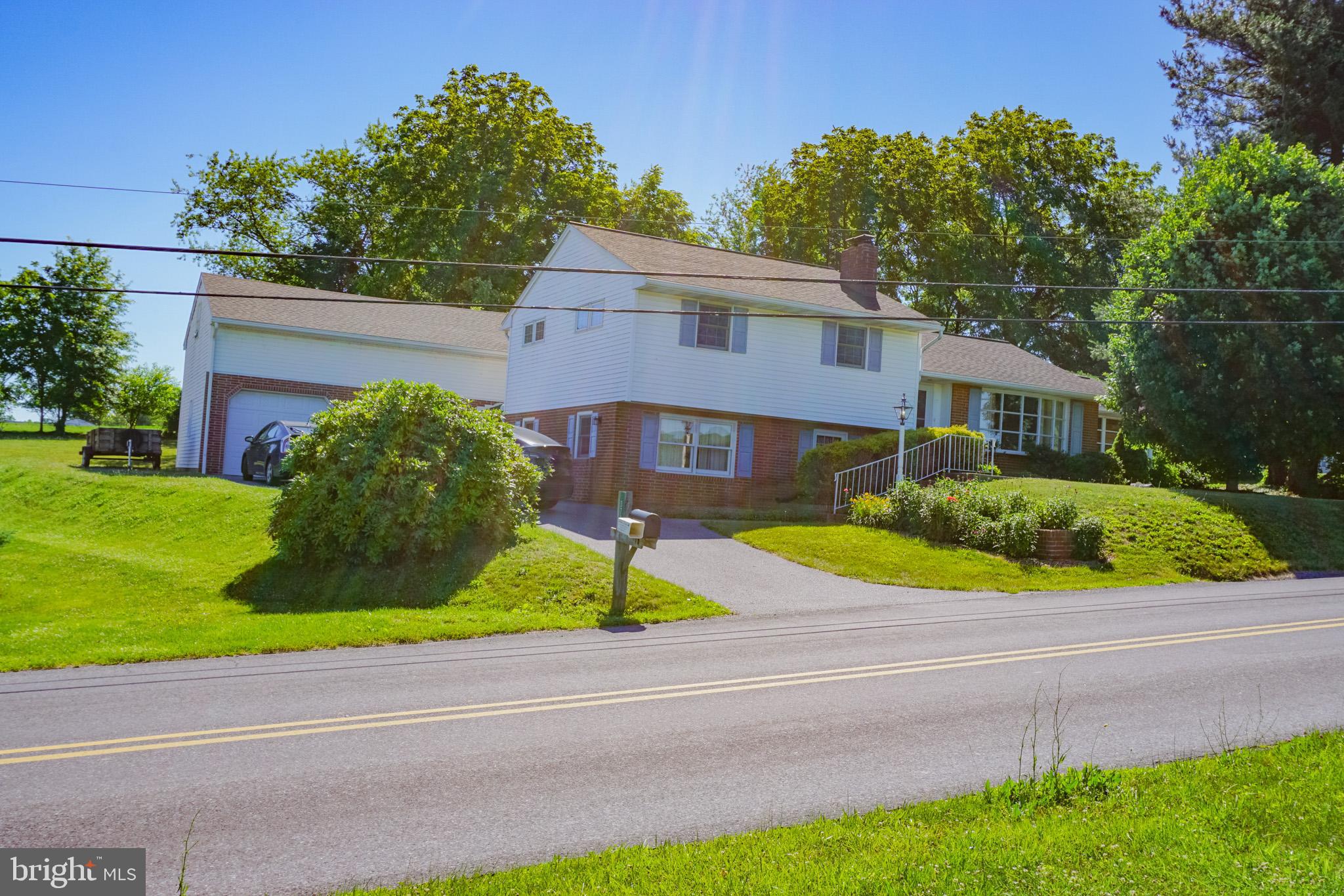 This property is for Public Auction. Terms: August 1, 2026 at 11am. Buyer’s Premium 6%. Seller’s confirmation. $15,000. Deposit due day of auction. 2% transfer tax split equally between buyer and seller.One owner, split level home, well maintained, 3 bed 2 and ½ bath. Primary bedroom features ½ bath on suite, 3-4 seasons room, root cellar, workshop, fireplace in lower level den, hardwood floors on main level, 1 acre manicured lot. Large 2 story garage. Rural setting.
Pride of ownership shines throughout this well-maintained, one-owner split-level home situated on a beautifully manicured 1-acre lot in a peaceful rural setting. Offering 3 bedrooms and 2.5 baths, the home features a primary suite with a private half bath, hardwood floors throughout the main level, and a cozy lower-level den with a fireplace.
Additional highlights include a versatile 3- to 4-season room, a workshop, and a root cellar for extra storage. Outside, you'll find a large two-story garage providing ample space for vehicles, hobbies, or equipment. Enjoy country living with plenty of room to relax, garden, and entertain.
