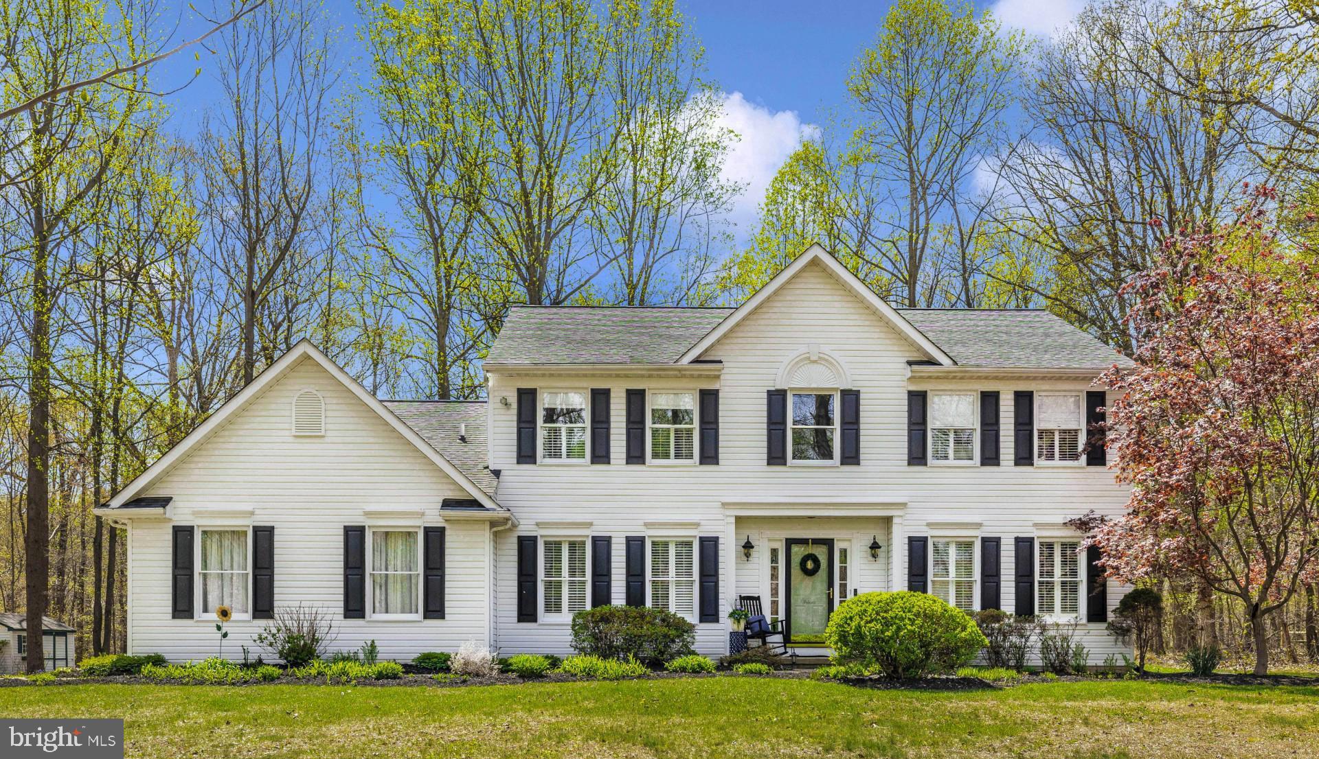 ***OFFER DEADLINE 4/29/25 AT 12 NOON.  This meticulously updated 4-bedroom, 3.5-bathroom home offers over 4,500 sq ft of luxurious living space on a private 1.36-acre lot in the desirable White Oaks community.    The home is located on quiet street at the end of the cul de sac.   The grand two-story foyer leads to expansive living and dining areas, perfect for entertaining. The chef’s kitchen features a designer island, granite countertops, stainless steel appliances, beverage refrigerator and a breakfast bar.  Huge walk-in pantry.  The 20'x26' family room boasts a custom floor-to-ceiling stone fireplace, cathedral ceilings, and abundant natural light.    The family room also features new beautiful hardwood floors.  Hardwood floors flow throughout the main level, guiding you into an expansive formal living room and a stylish dining area that’s perfect for hosting family gatherings or elegant dinner parties.  The primary suite includes a spa-like bathroom with a marble shower, soaking tub, and dual vanities.   Three additional bedrooms offer generous space, natural light, and beautifully appointed details.  The fully finished lower level offers a game room, wet bar, media area, and full bath. The basement has plenty of extra storage and two cedar closets.  Additional features include a 2-car garage, main-level laundry, updated lighting, and thoughtful upgrades throughout!   Outdoor amenities include a screened porch, deck, bluestone patio with fire pit and fish pond, and a treehouse.  There is also a walking or bike path to Twin Ridge Elementary.   Bus service is also provided for students.   This home is convenient to restaurants, shopping and major commuter routes. This home is a true masterpiece that blends style, comfort, and functionality.   Beautifully landscaped grounds that back to protected area.   This home won't last long.   Call Tammy today!