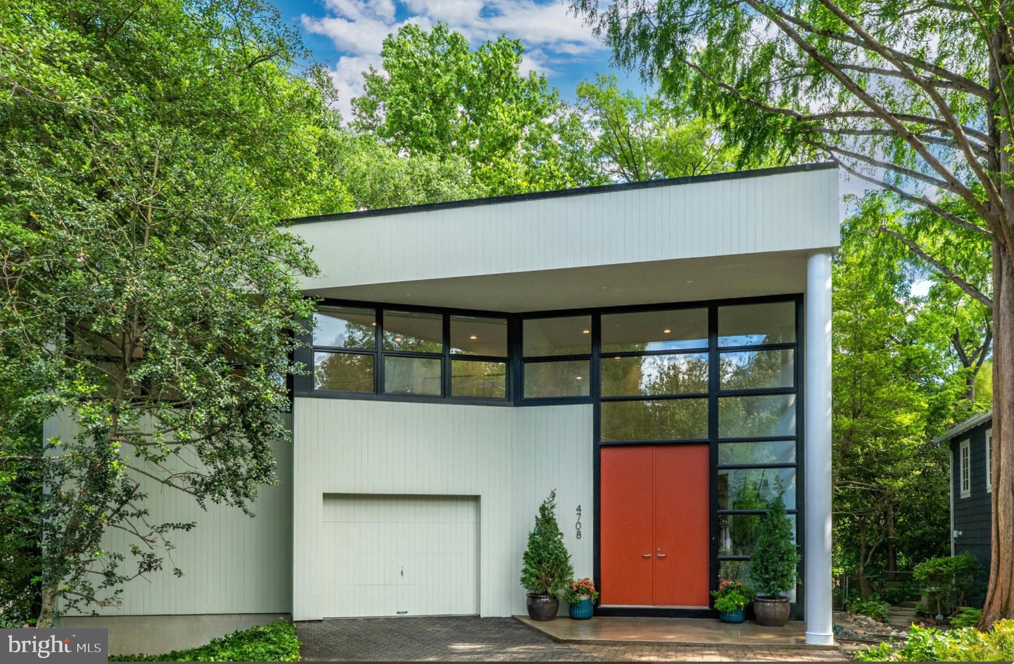 On Somerset’s premier street, on a quarter acre lot, sits Marilyn Stern’s architectural masterpiece of light and glass.   Eighteen foot ceilings on the main level welcome you to an open floor plan, fireplace, new kitchen and new powder room, and sweeping floor to ceiling, wall to wall, glass overlooking the expansive rear grounds. Ascend the two story foyer to the primary suite which spans the length of the residence with its skylit new primary bath plus three additional bedrooms and new hall bath.  The lower level features a walk out family room, den/office, bedroom and new full bath and abundant storage.  A motor court for four cars, an oversized single bay garage and two rear decks complete this oasis in Somerset Heights.  There will be no public open houses.  Showings by appointment.  Financial screening required.