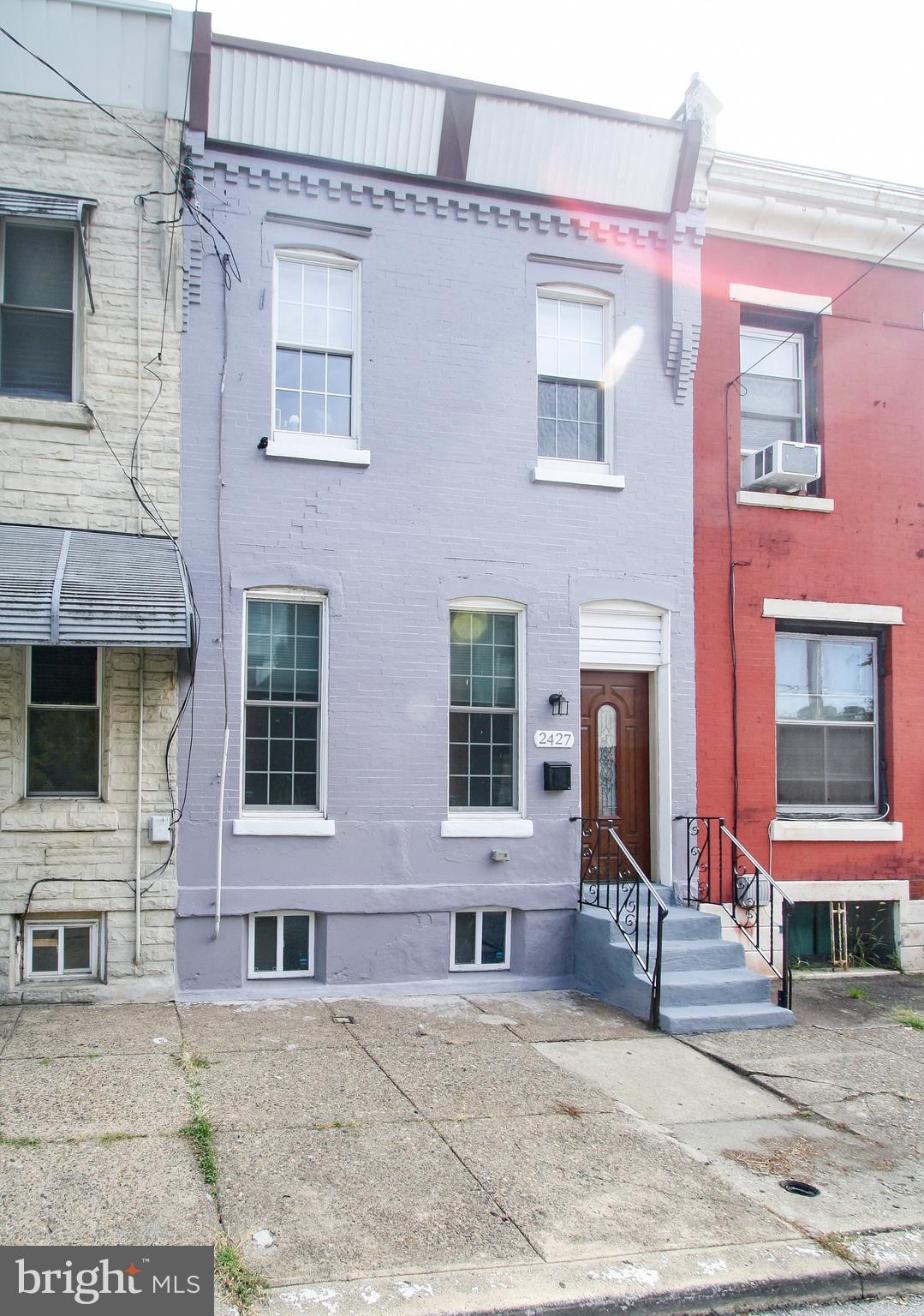 PRICE REDUCTION!! What a great opportunity to own a turn-key rental investment  property or be an owner occupant of this fully furnished, contemporary row within walking distance of Temple University. This freshly painted and nice size home with central air conditioning offers three bedrooms, 1.5 baths and kitchen with stainless steel appliances.  The laundry area and powder room are off of the kitchen.  Out back you’ll find a nice quaint and private backyard for your grilling needs. The basement offers a newer 60 gallon water heater, HVAC system and plenty of room for storage or finishing off for more living space.   A brand new roof was recently installed.   You will not want to miss this gem.