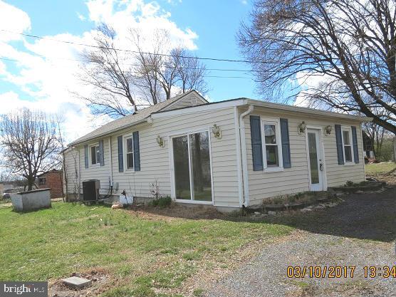 Help me become the coziest home in town. I need work but potential is there for a great place. End of road location for solitude yet close to shopping, schools etc. Porch with fan and sliders could be great sunroom. Freddie Mac First Look ends May 23rd for owner occupant buyers. Seller contribute up to $500 for home warranty. Restrictions apply.