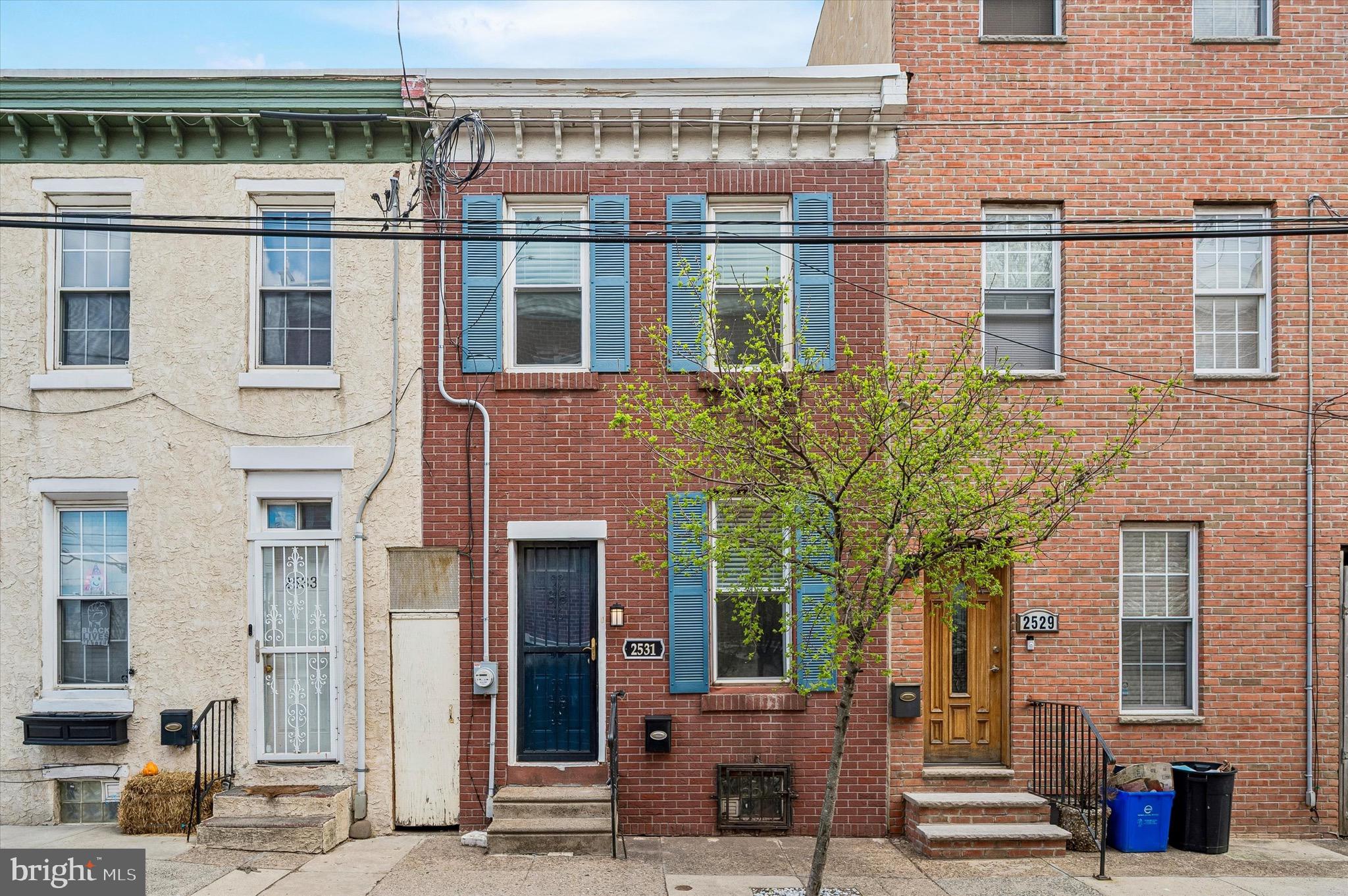 Welcome to 2531 Webb Street, a charming 2 bedroom, 1 bath home tucked away on a quiet block in Olde Richmond. Whether you are a first-time buyer or an investor looking for a strong opportunity, this home offers comfort, character, and value in one of Philadelphia’s growing neighborhoods. Inside, you’ll find hardwood floors, a bright and open living and dining area, and an updated kitchen featuring two-tone cabinetry, quartz countertops, stainless steel appliances, and a classic subway tile backsplash. The layout is practical and inviting, with two nicely sized bedrooms and a full bath upstairs with plenty of closet space in each. The home also features a private rear patio, perfect for grilling, relaxing, or enjoying your morning coffee, along with a full basement that provides laundry and plenty of storage space. Conveniently located near neighborhood favorites, shopping, dining, and major commuter routes, 2531 Webb Street is an excellent option for both homeowners and investors alike