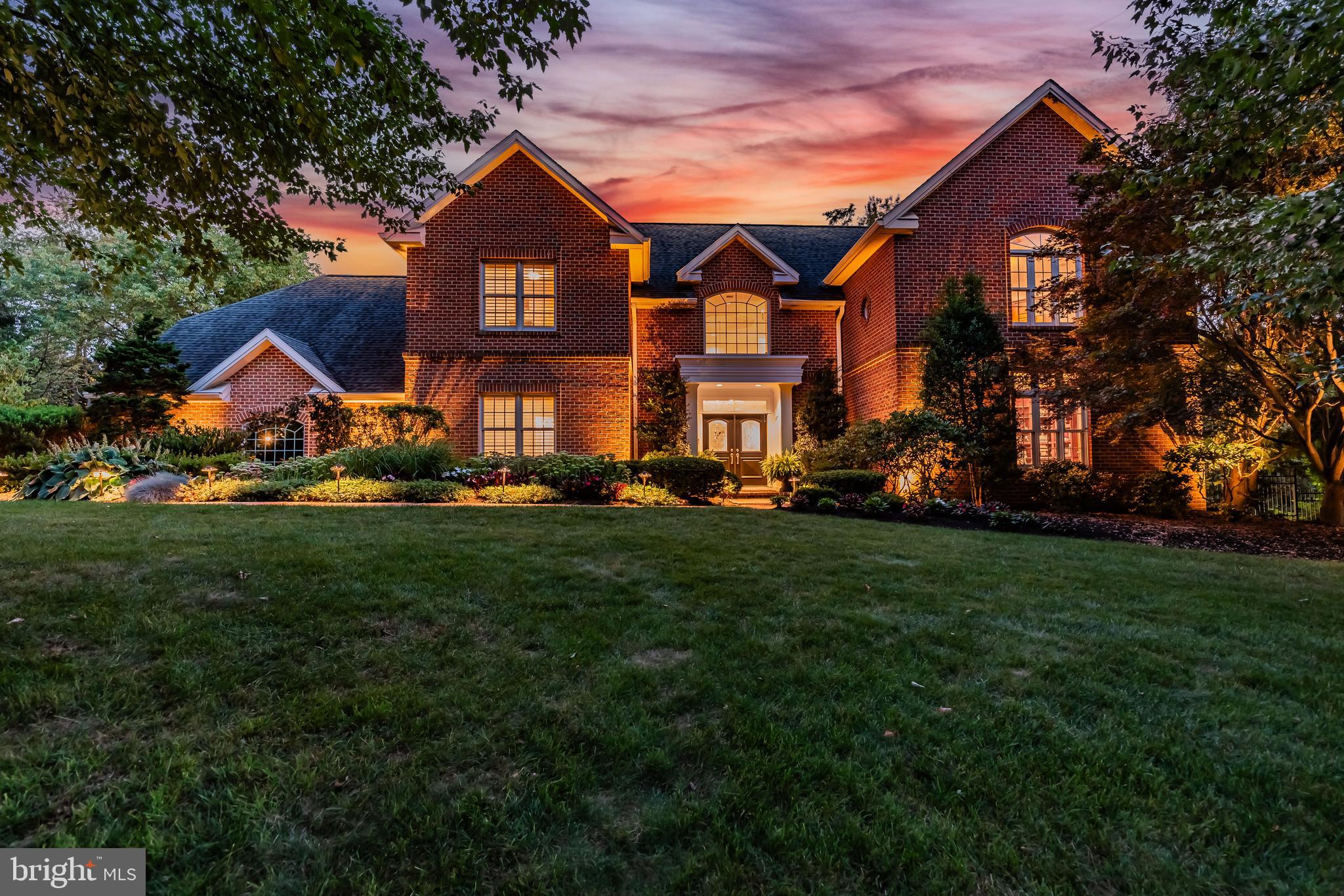 Welcome to your dream home in the prestigious White Oaks neighborhood! This stunning residence, crafted by renowned builder Farinelli, is situated on a lush 1.5-acre lot with over 6,000 SF of finished living space within the sought-after West Shore school district.  From the moment you step through the grand two-story foyer, you’ll be captivated by the home’s elegant design and luxurious features. The newly designed custom kitchen is a chef’s delight, boasting quartz waterfall countertops and top-of-the-line commercial-grade appliances. The adjoining two-story living room with a cozy fireplace provides an inviting space for both relaxation and entertainment. A formal dining room and a spacious library add to the home’s sophistication.  Convenience meets comfort with a thoughtfully designed guest or in-law suite on the main floor. Upstairs, the serene primary suite offers a tranquil retreat with its expansive walk-in closets and an  en suite bath. Two additional bedrooms share a well-appointed Jack-and-Jill bathroom, and a generous office suite, which can easily be converted into a fifth bedroom, completes the upper level.  The lower level is a true highlight, featuring a finished family room with a fireplace, a dedicated wine room with a tasting area, and an exercise room. A full bath and a kitchen service area add to the functionality of this space, ideal for entertaining or unwinding. Step outside to your personal oasis, where a 20x40 foot saltwater pool and hot tub await. Additionally, an indoor exercise pool provides year-round aquatic enjoyment.  This exceptional home combines luxury, comfort, and practicality in one breathtaking package. Don’t miss your chance to own this gem. Schedule your showing today and experience the unparalleled elegance of 1 Westwind Drive.