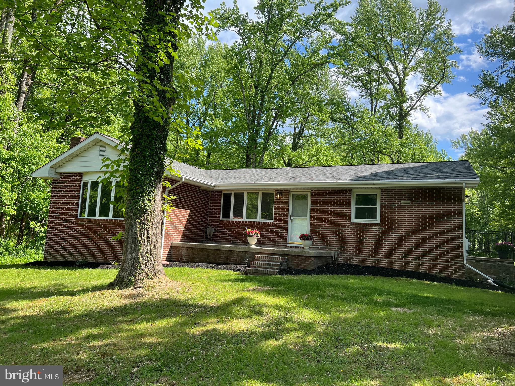 Level 3.3 acres, mostly clear with some woods. Updates through out including: Roof, kitchen cabinets, counters, and appliances. LVP flooring through out. Fresh paint. Masonry fireplace in large family room. Very convenient location. 2 miles to I95. Quiet and private with plenty of wildlife. Updated light fixtures, outlets and switches. Hook up for portable generator. Wrap around paved driveway. Call for appointment. Updated heat and A/C. 2148 sq ft above grade.