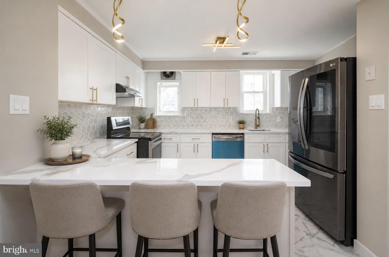 Welcome to 291 Jackson Ave, a beautifully renovated single-family detached brick home situated on a rare double lot on a quiet residential street in Lansdowne. This move-in-ready property combines modern upgrades, generous space, and an unbeatable location.

This spacious 2-story home offers 3 bedrooms, 2 full bathrooms, and 1 half bath, along with a full basement for additional storage or future living space. Renovated in 2026, the home features a brand-new kitchen, fully updated bathrooms, a new HVAC system, freshly painted interior, and newly sanded flooring throughout — providing a fresh, modern feel from top to bottom.

Outside, enjoy the charm of an open front porch and the luxury of a large yard made possible by the oversized double lot — perfect for entertaining, gardening, or outdoor activities. Parking is effortless with a 2-car garage and an extended driveway that accommodates up to four additional vehicles.

Ideally located on a quiet street just steps from parks, playgrounds, schools, and public transportation, this home offers convenience for everyday living while maintaining a peaceful neighborhood setting.

A rare opportunity to own a fully renovated home with exceptional space and location — schedule your private tour today!