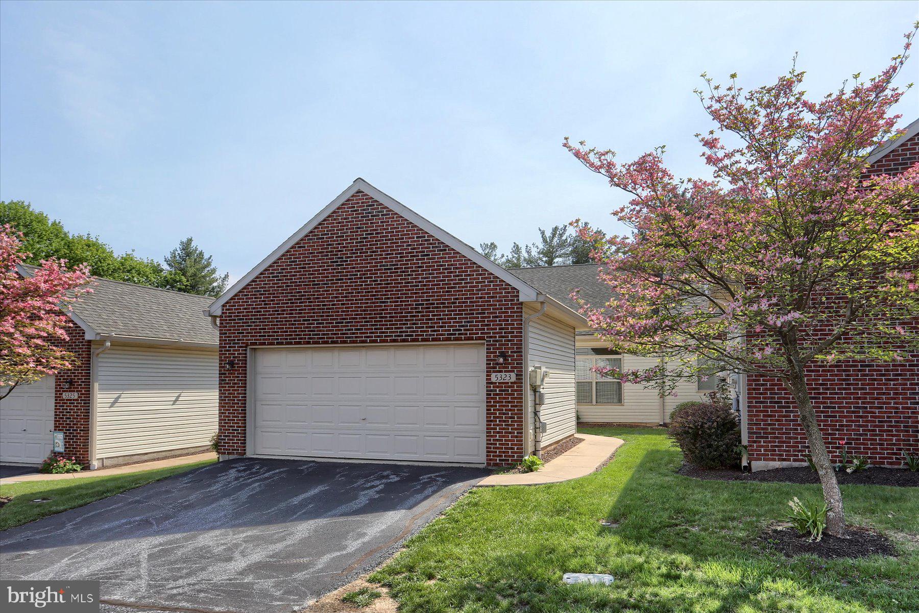 Places like this don't come around too often.  Don't miss this beautifully maintained 2-bedroom, 2 full bath, one-level condo with a spacious 2-car garage.  Enjoy the updated kitchen with beautiful quartz countertops, tile backsplash, and pantry,  plus new luxury vinyl plank flooring throughout.  The renovated full bath features a walk-in tiled shower and a double sink for added comfort.  Relax on the private back deck or take a stroll through this friendly and well-maintained neighborhood. You will love the ease of low-maintenance living, with the HOA covering exterior building maintenance and all outdoor upkeep.  Located just minutes from shopping, dining, and all that the area has to offer, this home combines comfort, convenience, and style in one perfect package. Don’t miss your chance to own one of the few one-level homes with a large 2-car garage in Wesley Mews!