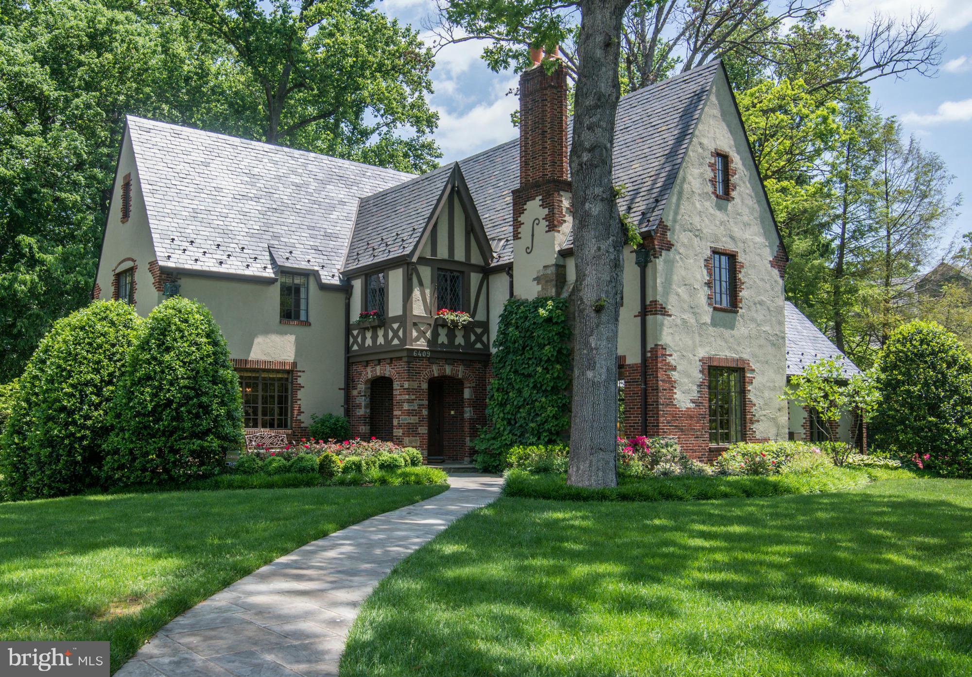 Magnificent light-filled Tudor combines classic features/architectural details. Seamlessly renovated/expanded to  6200 sq ft on 4 floors with an ELEVATOR. Designed by acclaimed architect, David Jones. 6BR/4.5 BA. Spectacular, sprawling .46 acre lot with parkland views and flowering shrubs everywhere. 2-car, over-sized garage. Walk to Capital Cres Trail and Bethesda!