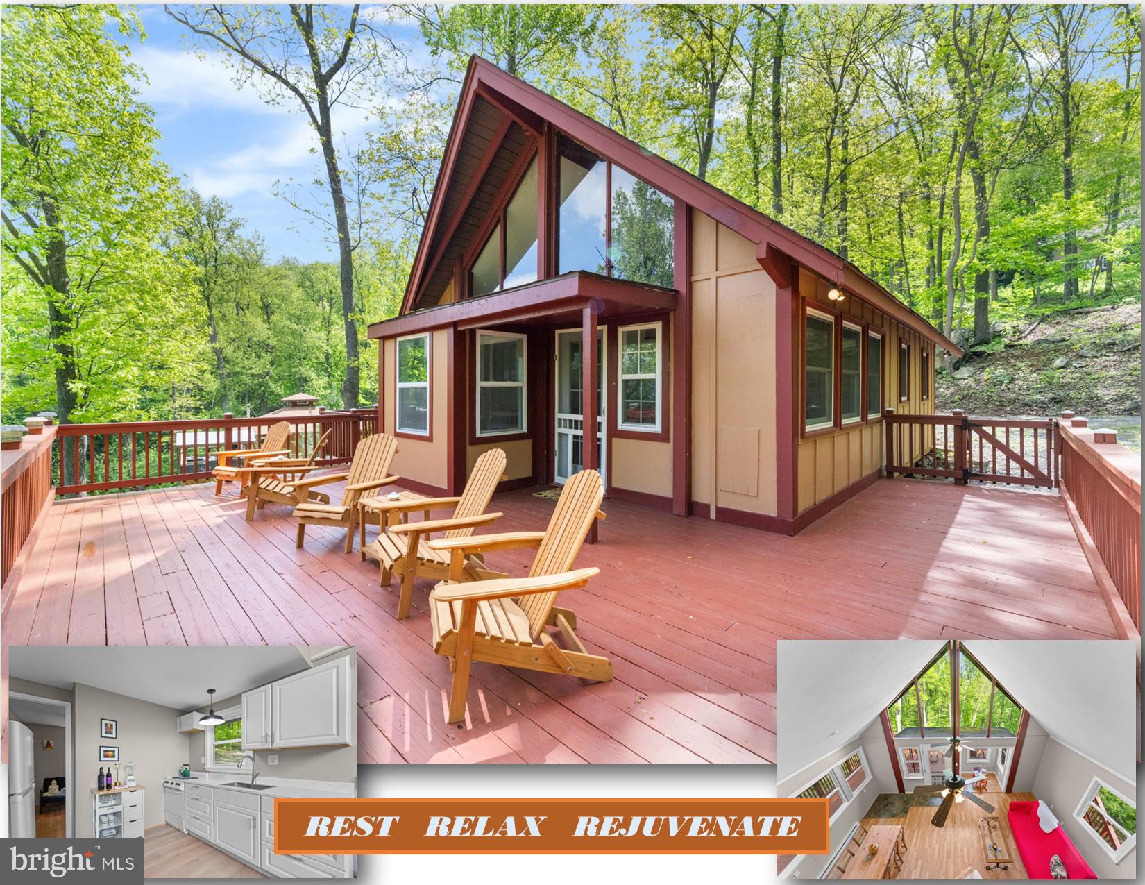 This beautifully renovated A-Frame with a loft is ready for your perfect summer getaway! Nestled in a peaceful, wooded, and private setting in the Blue Mountain area of Front Royal, this home offers a serene escape where you can unwind to the soothing sounds of the wind through the trees and nature’s chorus. Enjoy over 400 square feet of deck space, ideal for relaxing or entertaining.

As part of a welcoming community, you’ll have access to Blue Mountain Lodge and Deer Lake, oart if a POA, which features a beach and waterfront access for added outdoor fun. The oval gravel driveway, improved in 2020, provides easy access to the home.

Inside, the vaulted beamed ceiling creates an open and airy atmosphere, while large windows bring the beauty of the surrounding nature indoors. The main floor includes two comfortable bedrooms, plus a loft that offers flexible space for extra sleeping, an office, or a lounge area. The kitchen was fully remodeled in 2025 with modern finishes, complemented by a new tankless water heater and fresh contemporary paint throughout the home from the same year. Key updates also include an inspected & updated septic system in May 2026, complete replumbing in 2014, and a roof installed in 2010.

Explore Northern Virginia’s Wine Country or enjoy nearby outdoor adventures including hiking, Shenandoah National Park, canoeing and kayaking on the Shenandoah River, Skyline Drive, Skyline Caverns, and the Appalachian Trail, all within easy reach. Don’t miss a visit to the famous Apple House just minutes away for their legendary apple butter donuts. Birdwatchers will delight in the opportunity to spot a variety of species right from the balcony with your binoculars.

Check out the adjacent 1.38 Acre lot VAWR2014032