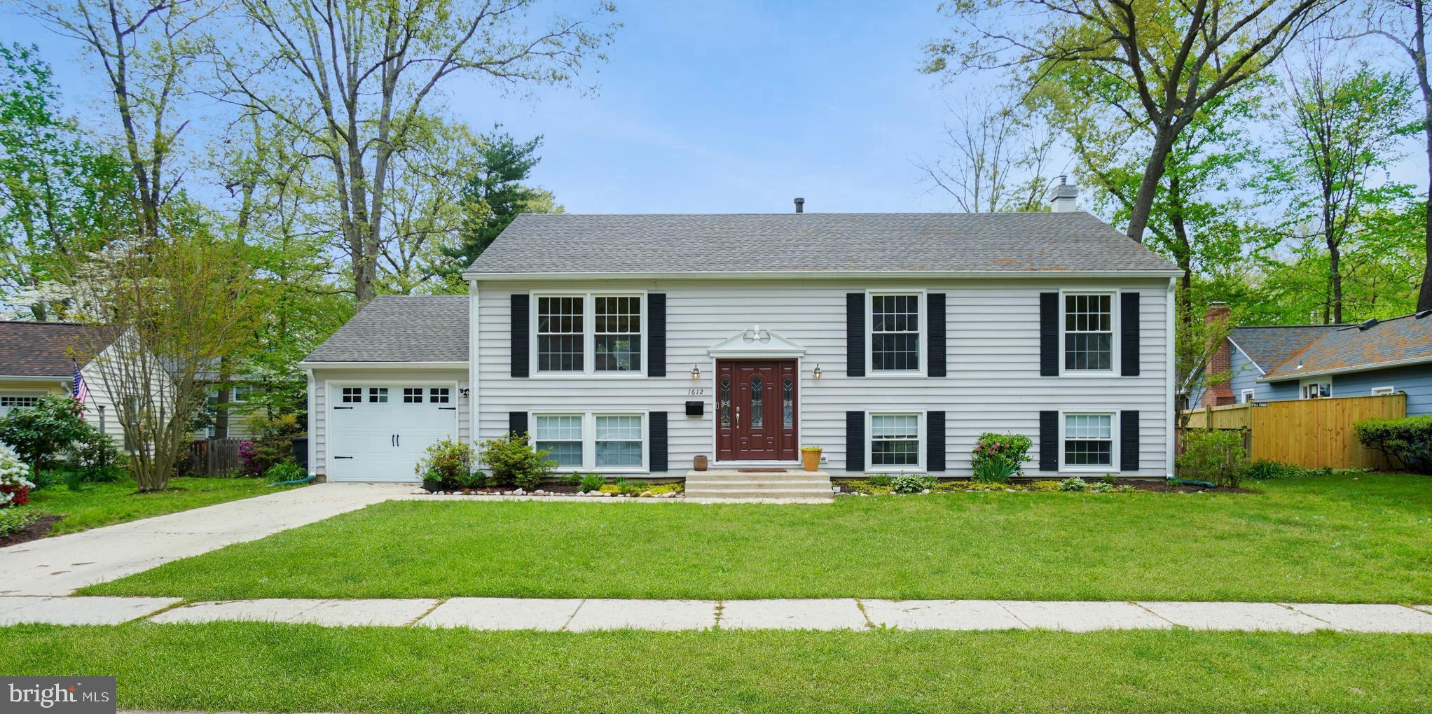 Buyer's financing fell through so this home is back on the market. 
Charming 5 bedroom/2 bath split foyer with garage in the coveted “E” section of the Crofton Triangle. The neighbors welcome you to the home with the big back yard that has been in the same family for over 50 years. Large windows flood the upper level with lots of light. Hardwood floors compliment the spacious 3 bedrooms, dining room, and family room. A kitchen ready for your vision, with a newer fridge, and windows overlooking a new deck (2020) and garden. Full bathroom with two sinks in the hallway and full master bathroom updated in 2020 to compliment the main bedroom. The lower level, fully renovated in 2020, has vinyl plank flooring, 2 large bedrooms, recessed lighting, gas fireplace, and lots of windows that compliment the lightly painted walls. A roughed in bathroom makes for an easy value add while presently showcasing the upgraded plumbing and sewer line (2020). New roof, gutters, garage door, exposed aggregate driveway, walkway, and steps, all done within the last year bring a whole new meaning to curb appeal. One year Home Warranty with Cinch Warranty . Owner is a licensed Broker in the state of Maryland. 
NOTICE: SCHOOL DISTRICT FOR THIS HOME IS AS FOLLOWS, CROFTON ELEMENTARY, CROFTON MIDDLE, CROFTON HIGH SCHOOL (incorrectly listed as Bowie High on Redfin).