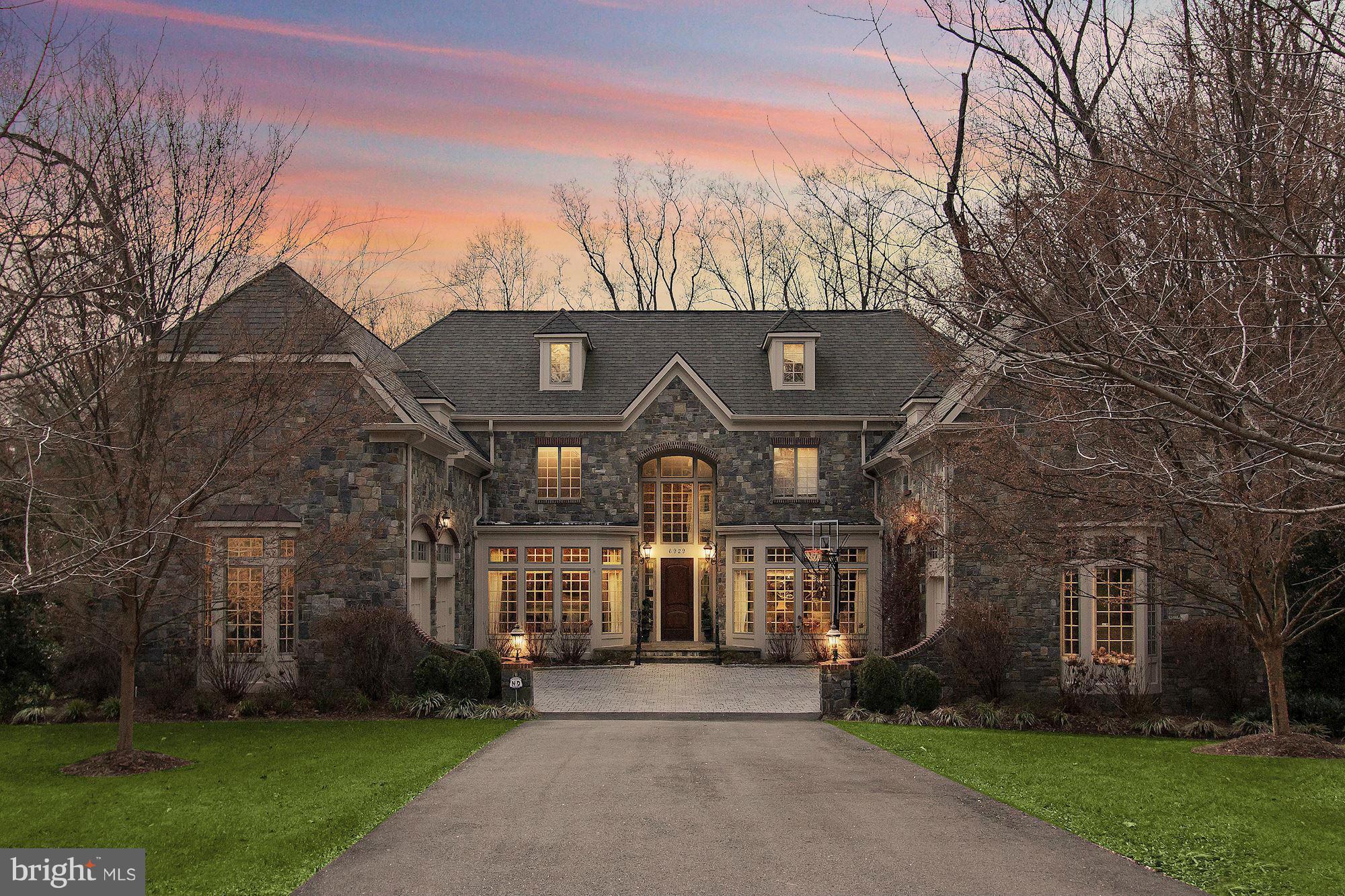 Welcome to River Oaks- one of McLean's most prestigious neighborhoods & home to this exquisite like-new stone manor.  Inspired by the stately estates of the English country-side, the trim, detail & craftsmanship of this nearly 10,000 square-foot residence combine to offer an extraordinary living experience.  Features include: two master suites,  gorgeous wooded lot with level backyard & more.