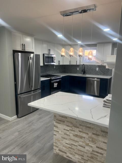 Amazing Remodeled Home. 4 bedroom with 2.5 bathrooms, Plenty of space t/o the house. Finished basement can be a play room, or a 5th bedroom. New Modern Kitchen with Stainless steel Appliances. Cortes Counter Top.  Plenty of Cabinet space and room to cook and entertain. Luxury Vinyl flooring.  Beautiful Stone Wall covered fireplace in living room. New Central HVAC.  Walking distance from Woodland Ave Business District. Minutes away from UNIVERSITY CITY. ( University of PA Hospital,  Mercy Health System, Drexel University, UOP , PHMC health Network,  Saint Joesph's Medicine School) and much more. Location is very convenient getting to the City and/or to the Philadelphia Airport. COME AND SEE THIS AWESOME HOME AND MAKE YOUR DREAM COME TRUE.