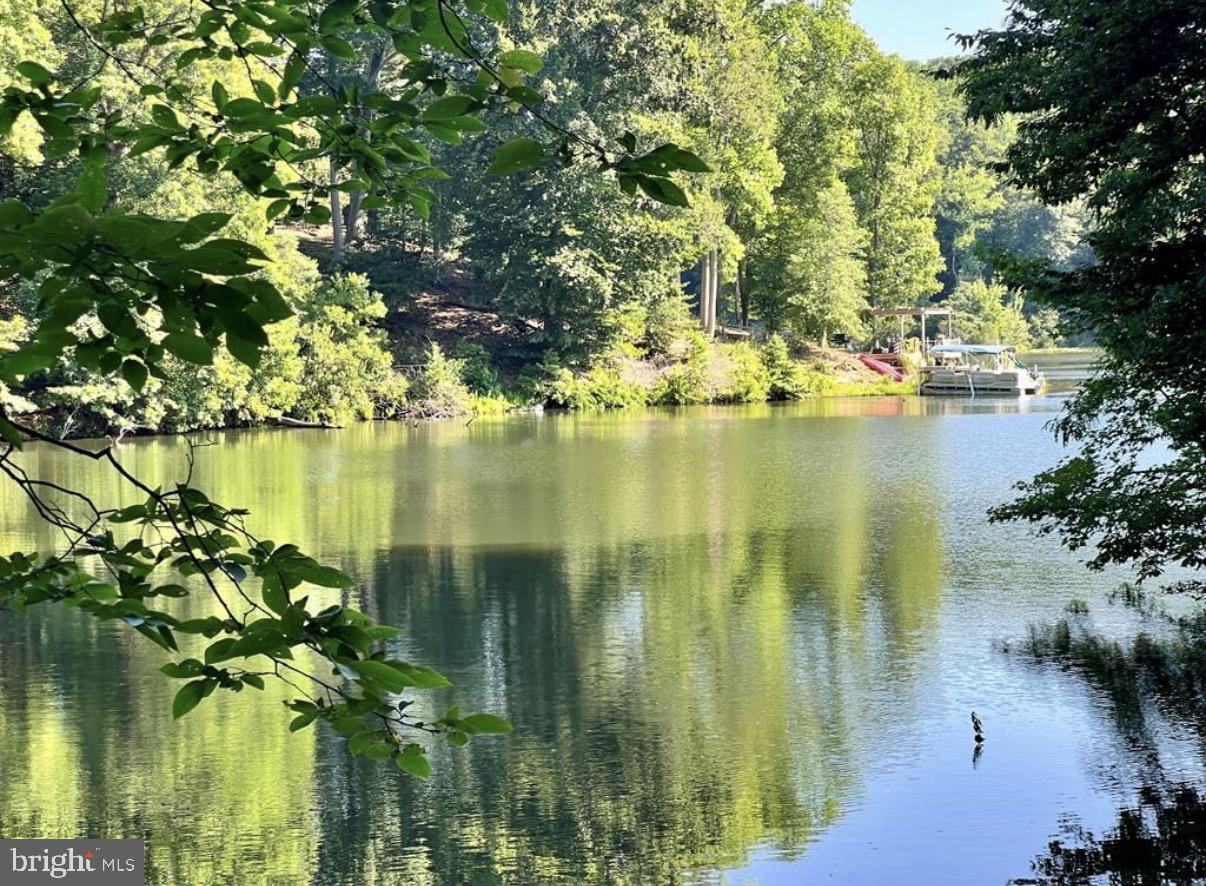 🌲 Lakefront Investment Opportunity – Build Your Dream Cabin + Income-Producing Potential 💰
Welcome to Independence Lake.

Escape to the perfect blend of nature, privacy, and income potential with this beautiful lakefront parcel. Nestled in a serene setting with direct water access, this property is an ideal canvas for your dream cabin or vacation retreat.

Wake up to peaceful water views, spend your days fishing, kayaking, or simply relaxing by the shore, and enjoy breathtaking sunsets right from your future porch. With ample space to build, this lot offers flexibility for a cozy getaway or a high-demand short-term rental.

✨ Highlights:
