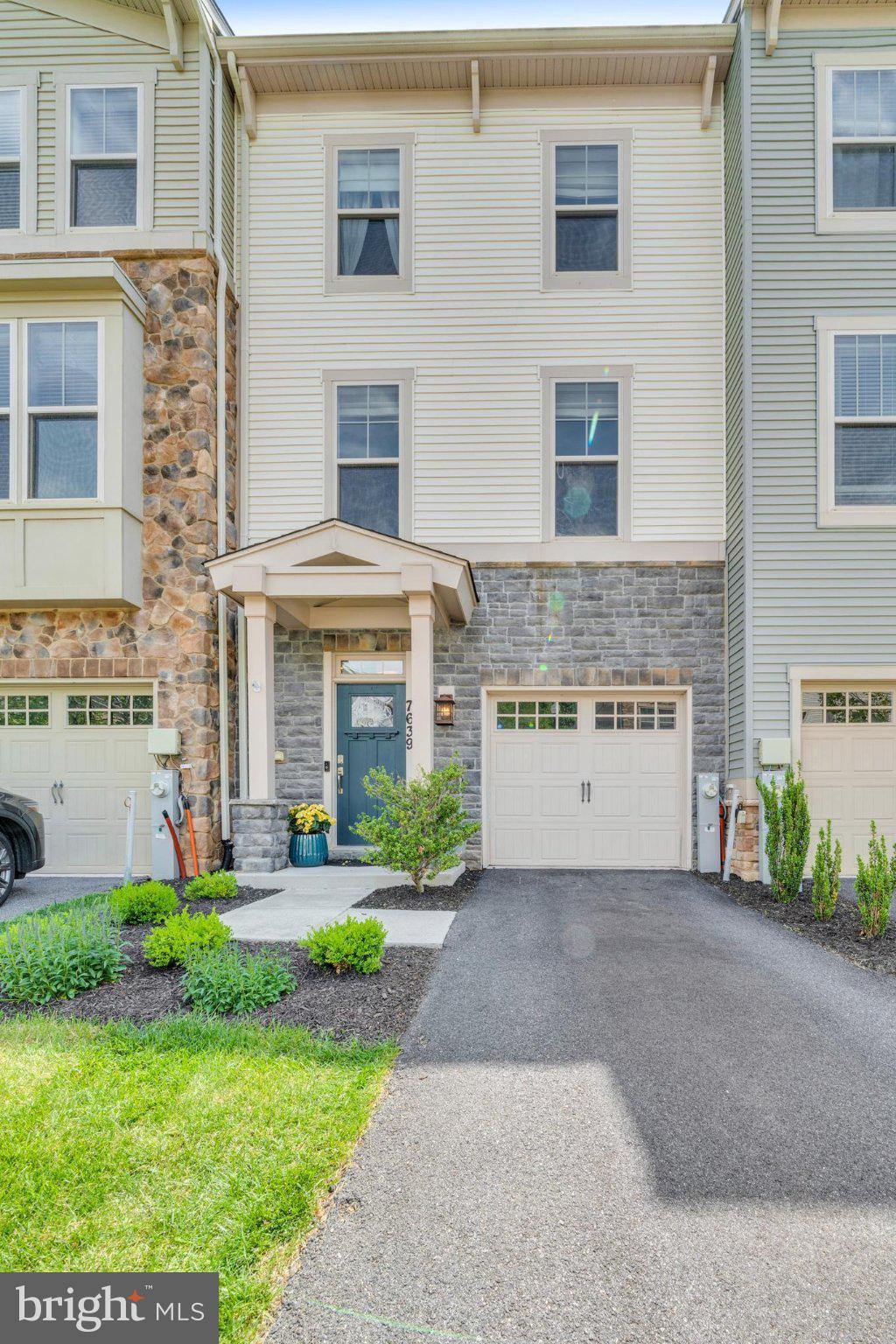 NEW PRICE.  
Nestled in the serene Tanyard Cove North community, this exquisite Craftsman-style townhouse offers a harmonious blend of luxury and comfort. Step inside to discover an inviting open floor plan adorned with rich hardwood floors and elegant custom  lighting. The gourmet kitchen, featuring granite countertops and stainless steel appliances, is a culinary enthusiast's dream, complete with a spacious island and a pantry for all your storage needs. The adjoining family room creates a perfect space for gatherings, while the formal dining area sets the stage for memorable dinners. The Gorgeous Dining Room Furniture is included. Retreat to the tranquil primary suite, boasting a luxurious en-suite bath, ensuring a private oasis for relaxation. Outside, enjoy the beautifully landscaped lot that backs to lush trees, offering a peaceful backdrop for outdoor living. The community amenities are unparalleled, featuring a sparkling in-ground pool, a fitness center, and scenic walking paths. Embrace the water-oriented lifestyle with access to canoeing, kayaking, and fishing along the nearby river. With an attached garage and a charming patio for al fresco dining, this home is designed for both convenience and leisure. Experience the exclusive lifestyle that Tanyard Cove North has to offer, where every detail is crafted for your comfort and enjoyment.