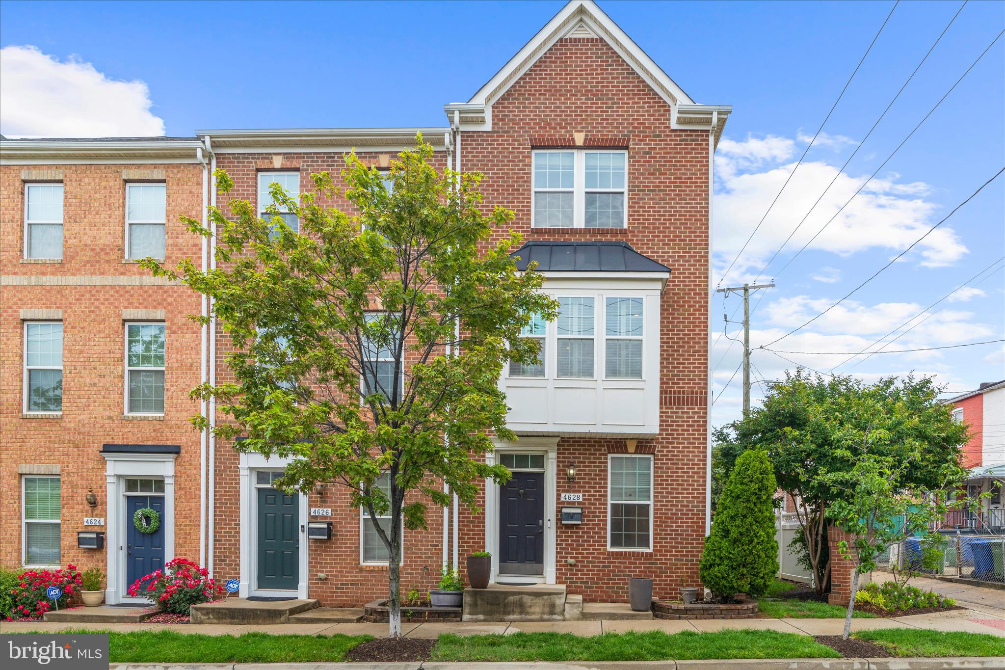 Rare opportunity to own a large end-unit townhouse in the desirable Greektown/O’Donnell Square community with off street parking! This beautifully updated home offers 4 finished levels, incredible flexibility, and designer touches throughout. The entry level features an over-sized mudroom with custom built-in cubbies/wall storage, convenient half bath, and access to the finished garage.

The main living level showcases gleaming hickory floors with an updated kitchen complete with stainless steel appliances, granite countertops, center island, tile backsplash, pantry, and breakfast bar overlooking the spacious family room. Just off the kitchen, enjoy outdoor entertaining on the private trex deck featuring a custom pergola.

The third level offers two bedrooms, two full baths, and convenient laundry. The spacious primary suite includes dual closets, custom built-ins with desk space, and a stunning ensuite bath with dual vanity and spa-like shower with rain head.

The top floor provides endless possibilities with an additional private primary suite featuring a large walk-in closet and updated ensuite bath. 
Additional highlights in the home include two built-in safes, crown molding throughout, 1 car garage plus 1-car driveway parking, and abundant street parking. Easy access to 95 and all dining & shopping Baltimore has to offer! The O'Donnell Square community hosts wonderful neighborhood events throughout the year, including monthly Third Thursday gatherings featuring food trucks, as well as community get-togethers, block parties, and neighborhood yard sales.
