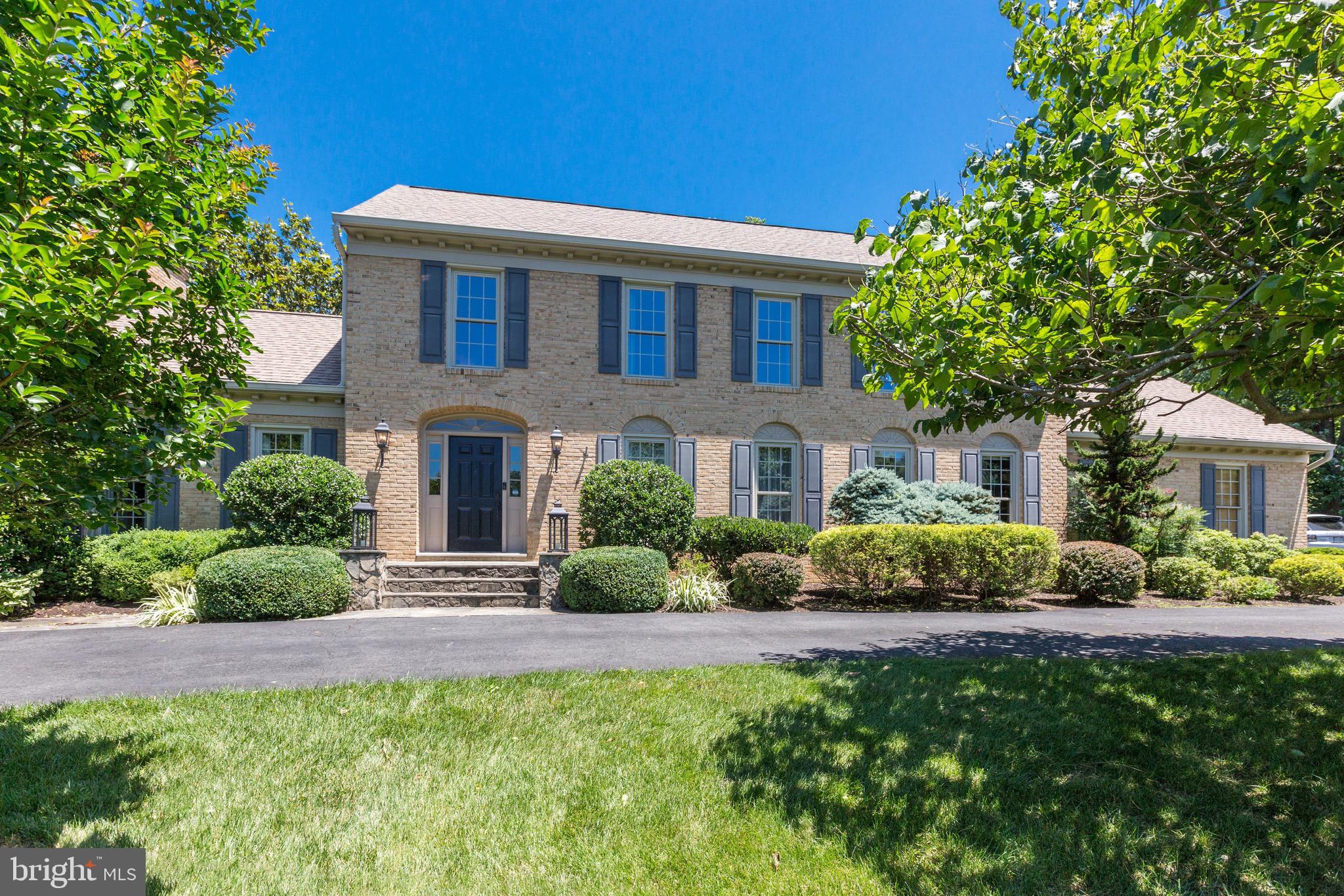 Perfectly situated on nearly one acre. Stunning interior, renovated kitchen, baths, and sleek wide plank hardwood on all three levels. Light filled rooms with floor to ceiling windows offer great views of the expansive backyard. Gourmet kitchen with breakfast bar has Italian marble counters with waterfalls, stainless steel back-splashes, new custom cabinetry and the breakfast nook opens to a cozy screened in porch. Formal living room, dining room, family room with stunning stone fireplace and a study complete the main level. The spacious master suite has a sitting room with fireplace. All updated baths have floor to ceiling tile, showers with designer doors, vanities with upgraded faucets, and a Moreno double sink in the master bath. Three more bedrooms and an updated hall bath complete this level. The lower level features a recreation room with fireplace, an office with built-ins, an exercise/au pair room, full bath and storage/workshop. McLean Estates is a sought-after community just blocks to sports fields, Spring Hill Rec Center and Spring Hill Elementary School. Residents enjoy walking, jogging, or bicycling through the connecting neighborhoods. Just minutes to shopping, entertainment and dining in downtown McLean and Tysons. The Silver Line Spring Hill Metro station is less than 2 miles, and there is easy access to the Dulles Toll Road, I-495 and I-66.