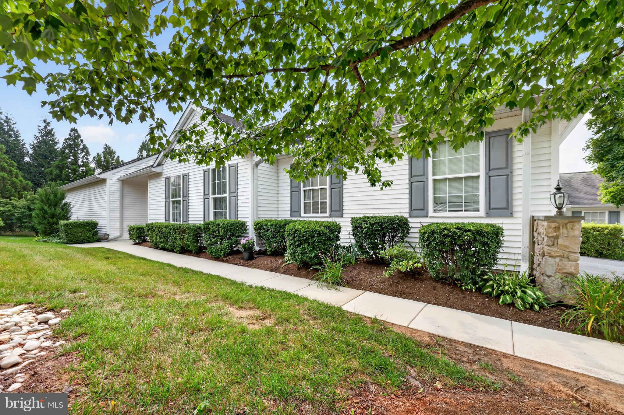 Just Listed! Beautiful 2-Bedroom, 2-Bath Ranch Home in the Highly Desirable Fox Hill Farm 55+ Community

Welcome to this beautifully maintained single-story ranch home, ideally situated on a quiet cul-de-sac in the sought-after Fox Hill Farm 55+ community. Offering the ease of one-floor living, this move-in-ready home combines comfort, style, and convenience in a peaceful setting.

Step inside to a welcoming ceramic tile foyer with a coat closet, leading into a spacious living and dining area that's perfect for both everyday living and entertaining guests.

The updated eat-in kitchen features hardwood flooring, neutral granite countertops, a large center island, abundant cabinetry and counter space, recessed lighting, and plenty of room for casual dining.

Just beyond the kitchen, the oversized family room is warm and inviting, hardwood floors, a cozy gas fireplace with a marble surround, double windows that fill the space with natural light, and a ceiling fan—creating the perfect place to relax or gather with family and friends.

Glass sliding doors from the kitchen open to a spacious deck with a retractable awning, overlooking a tranquil pond and open green space. It's the perfect spot to enjoy your morning coffee, entertain guests, or simply unwind while taking in the peaceful views.

The generously sized primary suite offers double windows, a ceiling fan, a walk-in closet, and an additional double closet. The private en-suite bath features a double-sink vanity, stall shower, tile flooring, skylight, and a convenient linen closet.

A spacious second bedroom includes double closets and easy access to the full hall bathroom with a tub/shower combination.

The main level also includes a convenient laundry/mudroom with an additional storage closet and direct access to the attached two-car garage.

The finished basement provides valuable additional living space, perfect for a home office, recreation room, media room, or hobby area, along with a separate unfinished storage space.

Additional highlights include a two-car garage with a new garage door opener, two new remote transmitters, a keypad entry system, and nearby guest parking for added convenience.

Residents of Fox Hill Farm enjoy an exceptional lifestyle with outstanding community amenities, including indoor and outdoor swimming pools, a clubhouse, fitness center, library, tennis courts, and scenic walking trails—everything you need to stay active and connected.

Ideally located just minutes from the Wawa Train Station and major commuter routes including Route 1, I-76, I-95, and Route 202, this home also offers convenient access to Philadelphia International Airport, just 25 minutes away.

Don't miss this wonderful opportunity to own a beautifully maintained home in one of the area's most desirable active adult communities. Schedule your private showing today!