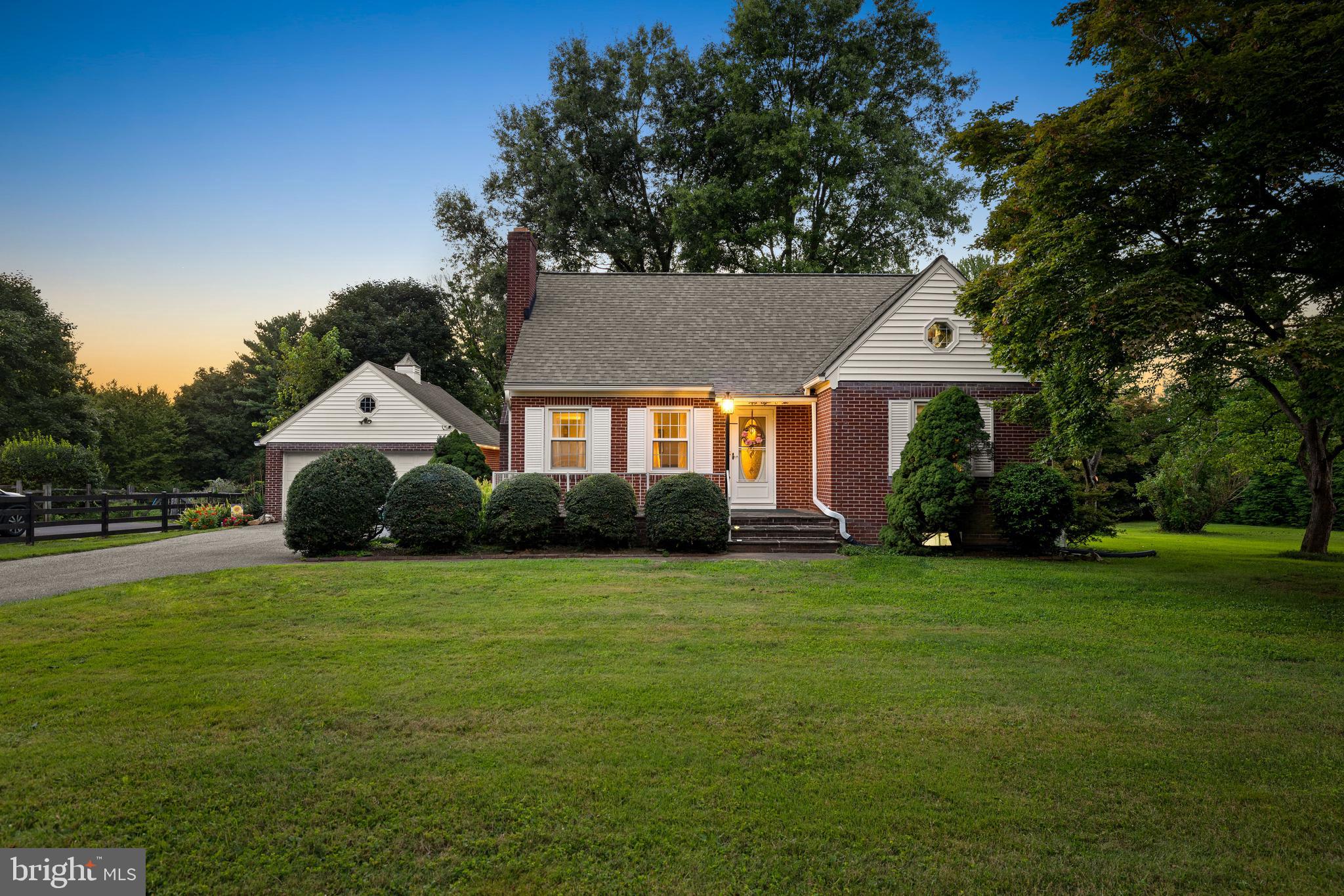 OPEN HOUSE 9/10 CANCELLED
The most charming cape cod in Upperco! This lovingly maintained home has all the things you are looking for. Starting with the outside, you'll be enamored by the brick exterior, bluestone patios, large 2-car garage w/ overhead storage, and huge yard! Entering the home, you are welcomed by hardwood floor, a spacious living room w/ fireplace, followed by an updated kitchen/dining combo. Beyond the stunning kitchen, you'll find a cozy great-room, featuring a stone fire place & access to the fenced backyard. The remainder of the main floor features the the primary bedroom,  updated full bath, and a second  spacious bedroom. Upstairs you'll find an enormous bedroom, bonus/office space, a half bath, and tons of storage! The lower level features a large unfinished space that is ready for your vision, laundry, and walkout stairs to the backyard. Updates included- main floor bath renovation 2007, kitchen remodel 2016, shingles over the garage & family room replaced 2014, gutter guards 2014, main house shingles replaced 2020, new hot water heater 2022, new well pump 2014, new pressure tank 2019, siding replaced 2023, & the septic was pumped in 2021. Don't miss it, schedule your appointment today!