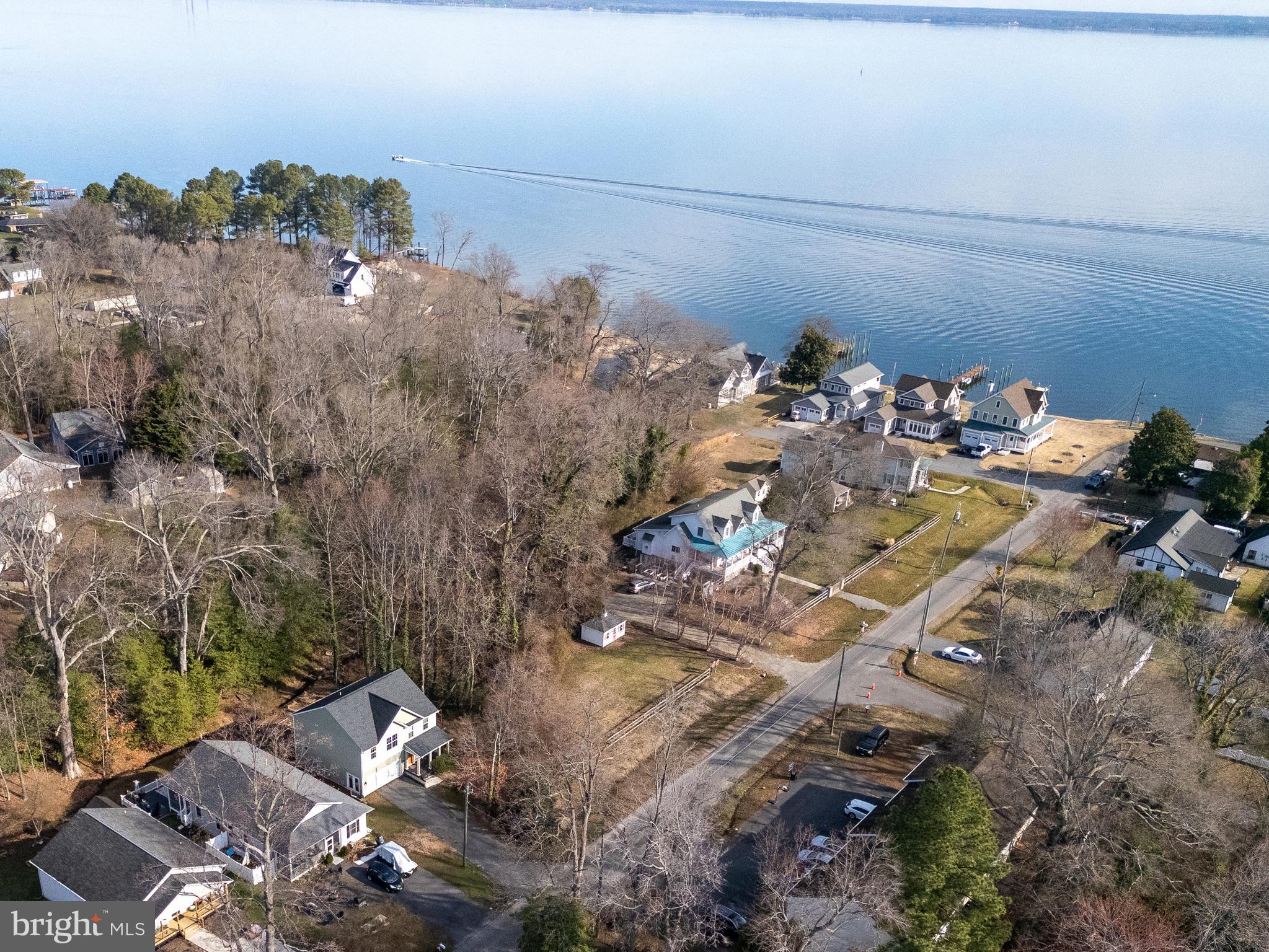 If you’ve been searching for a home that offers space, privacy, and easy access to everything Colonial Beach has to offer, this one checks all the boxes. Built in 2018, this 4-bedroom, 2.5-bath home offers over 2,000 square feet of living space on a quiet lot backing to mature trees—providing a peaceful setting while still being just minutes from everything Colonial Beach has to offer.

Inside, the main level features a layout designed for everyday living and entertaining - including a spacious family room that opens to a bright kitchen with stainless steel appliances, plenty of cabinetry, and a comfortable breakfast area.

Upstairs you'll find four generously sized bedrooms, including a large primary suite with a walk-in closet and private bath. The convenient upper-level laundry makes daily routines simple.

Step outside to a large backyard with wooded privacy, offering plenty of space for gardening, entertaining, pets, or play. The home also features a fully insulated two-car garage and oversized paved driveway, giving you plenty of parking for guests and weekend gatherings.

Located in the Classic Shores community just minutes from the heart of Colonial Beach, you can hop on your golf cart and enjoy everything that makes this town so special.

Whether you're looking for a full-time residence, weekend retreat, or investment property, this home offers space, comfort, and an unbeatable location near the water.