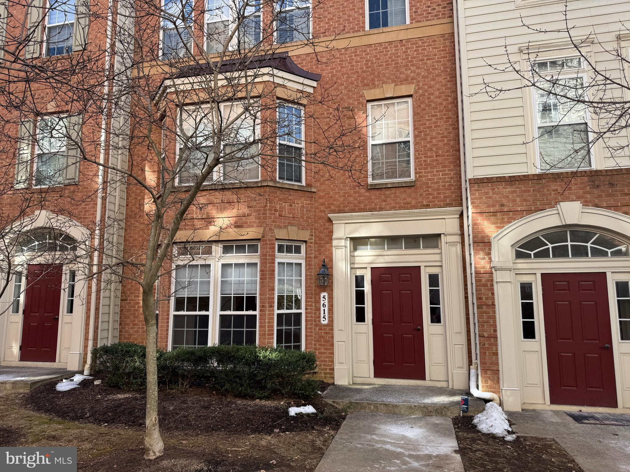 Awesome Location, Right off I-395! Beautiful Brick, Interior 2-Level Townhome in Sullivan Place * Bright,  Great Room with High Ceilings, Gleaming Hardwood Floors and Electric Fireplace with Mantel * Floor-to-Ceiling Wall of Windows/Double-wide Bay Window area offering lots of light and slight Bumpout providing more space to the area * Wonderful Kitchen Featuring Corian Countertops, Stainless Steel Appliances, 42" Cabinet Storage, and Kitchen Island/Breakfast Bar * Main-Level Half Bathroom and Entry closet with Direct access to Garage * Light-filled Bedrooms with Plenty of Closet Space * Huge Primary Bedroom with Tray Ceiling, and Crown Molding features 2 Walk-In Closets and Double-wide Bay Window bumpout * Primary Bathroom Features Glass Enclosed Stall Shower, Dual Shower Heads, and Dual Sink Vanity * Spacious 2nd Bedroom with Access to Sun-facing Balcony Wood Deck with views of Community Pool * Bright 3rd Bedroom with Sun-filled window * Both have easy access to Hallway Bathroom * Laundry Area on Bedroom Level with Updated Washer/Dryer (2022) * Other updates: HVAC-2018, Water Heater-2024, Microwave-2024, Dishwasher-2023, Roof over Bay window-2024, Balcony-2023 * Community Amenities include: Jog/Walk Paths, Community Pool, and Common Grounds * Shuttle to Van Dorn Metro Station * Close to Panera Bread, Thai Restaurant, Dunkin and Gas Station * Quick Access to 1-395 and Less Than 10 Miles to DC