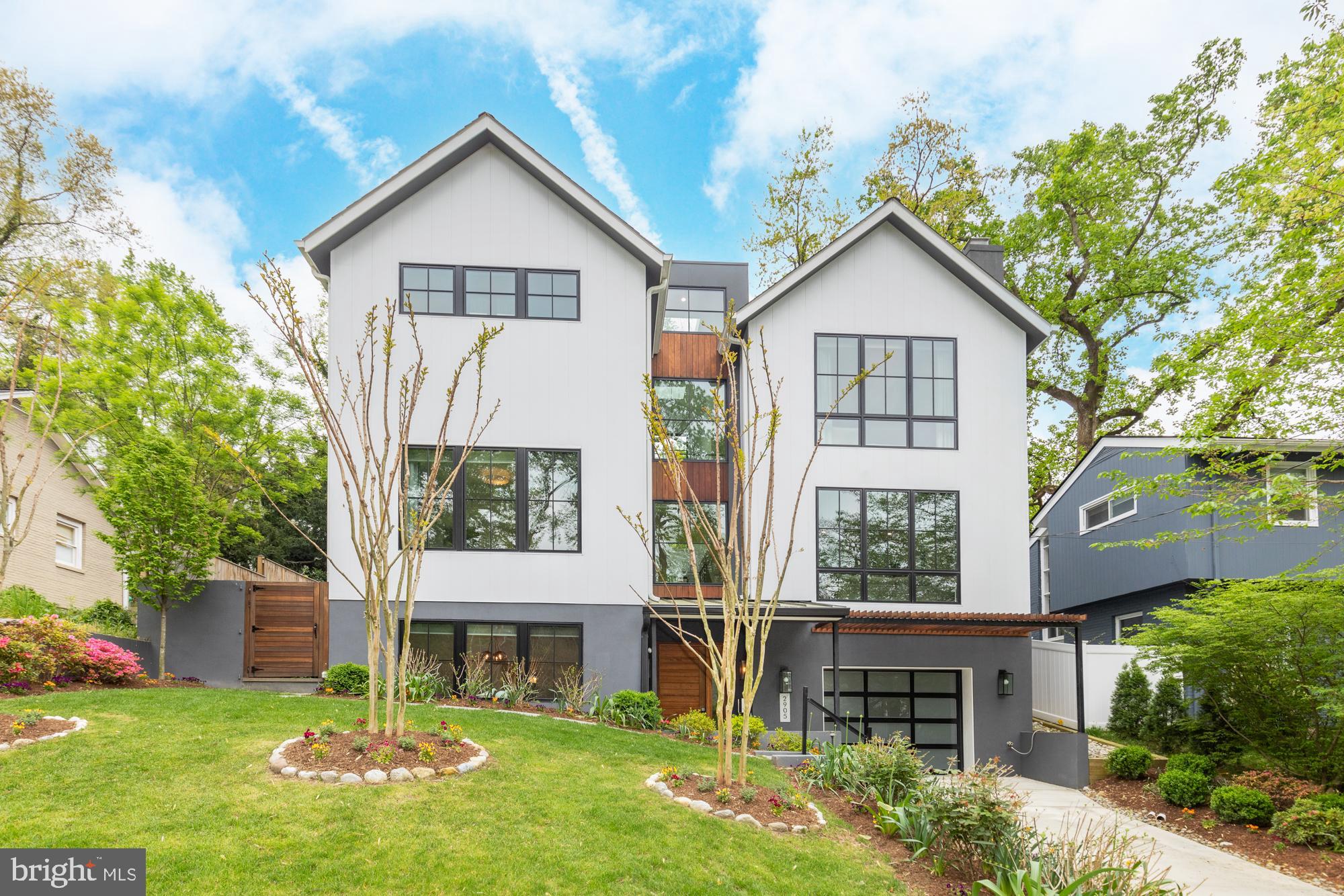Welcome to 2905 Arizona Ave. NW.  This stunning five-bedroom, three full bath plus two half bath home was built in 2020.    When you step inside you will discover an open and airy interior that effortlessly blends warmth with comfort.  The combination of beautiful woods,  contemporary design and oversized windows that frame the most beautiful trees will captivate you. 

The heart of the home is the gorgeous chef's kitchen, a culinary masterpiece that will inspire your inner chef and delight your guests.  With too many features to list, we promise it won't disappoint.  The kitchen looks onto the a dreamy patio with an outdoor grilling station and fridge, perfect for entertaining and enjoying beautifully landscaped surroundings, 

The primary suite is a true retreat, offering a level of luxury that goes beyond expectations.  With spacious dimensions, a drool-worthy walk-in closet, gorgeous bath with dual sinks, separate W/C, soaking tub and luxurious shower.  It's a sanctuary to unwind in style.  Additionally, this home features a breathtaking terrace perched high to practice your yoga or drink of glass of wine.  

The oversized garage features an electric charger catering to the needs of modern convenience and sustainability and enough room to store bikes, golf clubs, etc.

This home is an embodiment of modern elegance and timeless appeal, offering a lifestyle of sophistication and relaxation.   Don't miss the opportunity to make this extraordinary property your own.