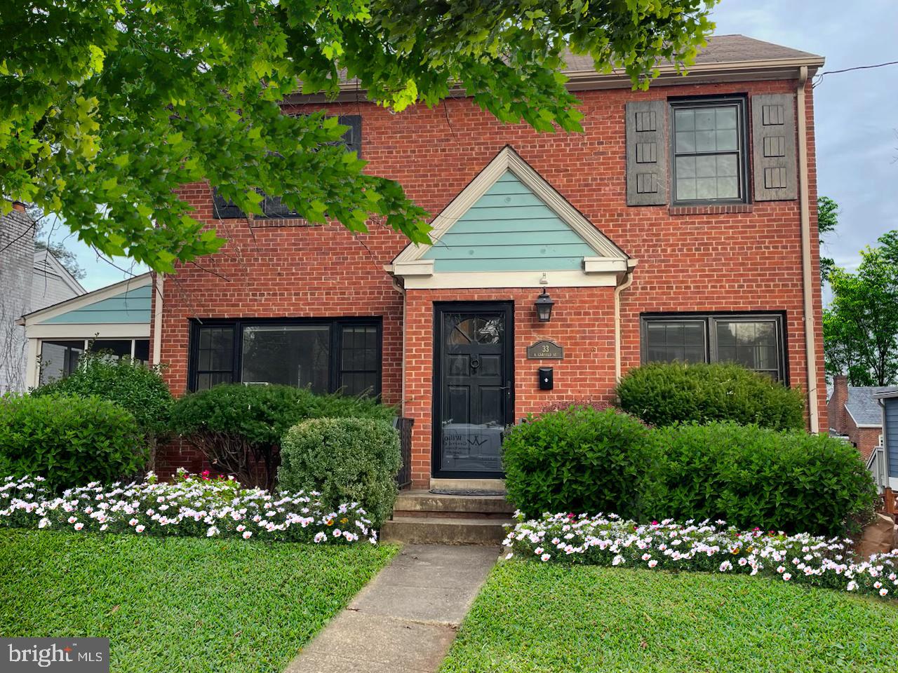 Solid brick Colonial in super convenient location, approximately one mile to Clarendon Metro and its vibrant neighborhood shops and restaurants.  The living room has a wood burning fireplace, three exposures, and opens to a screened porch. Handsome hardwood floors on first and second levels.  Updated kitchen features recent appliances, handsome counters and backsplash, and is adjacent to the family room, which overlooks the ample rear yard.  At-grade walk-out lower level offers a paneled recreation room, full bath plus generous storage, laundry and utility areas.  Fixed stairway to unfinished attic. Long driveway, new garage-size shed, vegetable garden in fenced rear yard.  Freshly painted and move-in ready!  Please submit offers by 4 PM on Monday, January 22.