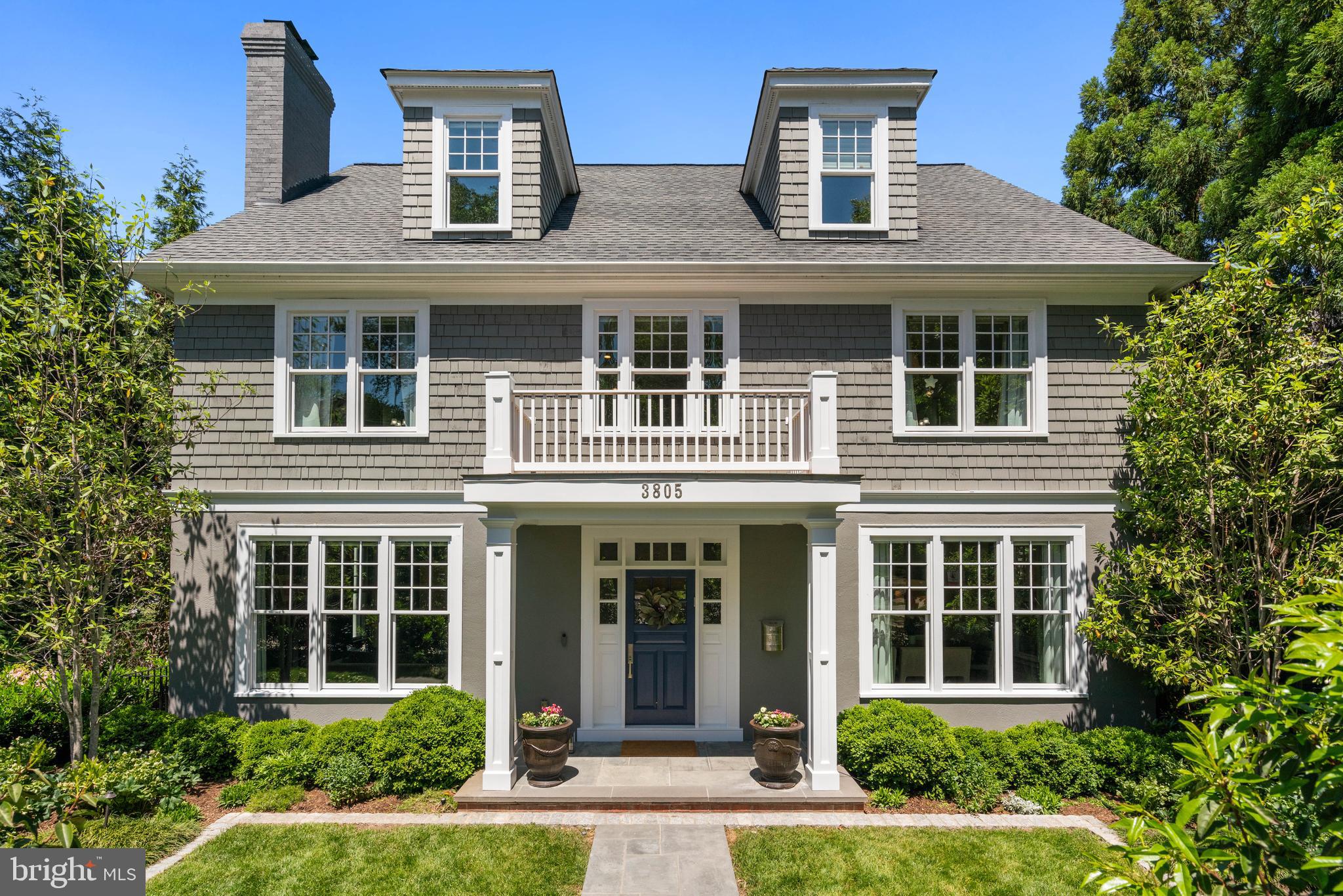 This distinguished five-bedroom, five-bathroom residence features a desirable blend of timeless architectural detail and contemporary refinement, ideally situated in the heart of Chevy Chase, D.C. Moments from Connecticut Avenue's celebrated collection of boutiques, cafés and restaurants, the property offers an exceptionally desirable address while preserving a rare sense of privacy within one of Washington's most sought-after neighborhoods.
Custom built with unwavering attention to craftsmanship, the home's high ceilings, five fireplaces, exquisite millwork, and abundant natural light create an atmosphere of warmth and architectural distinction. A whole-house audio system and expansive open floor plan further enhance the home's effortless livability and refined character.
The gourmet kitchen has been thoughtfully designed with a center island, a custom backsplash, refined lighting, and a complete suite of stainless steel appliances, offering an exceptional setting for both grand entertaining and everyday living. An adjoining breakfast room provides an inviting space for informal dining.
Framed by expansive windows overlooking lush trees, the formal dining room enjoys a peaceful setting and is complemented by a pantry just off the kitchen. The striking lapis-hued formal living room, centered around a fireplace, flows seamlessly into the adjacent family room, where matching architectural details create a cohesive and sophisticated entertaining space. A powder room completes the main level.
The second level is home to three generously proportioned en-suite bedrooms, each designed as a private retreat of exceptional comfort and scale. The luxurious primary suite features an expansive walk-in closet and a sleek spa-inspired bath with a frameless glass shower, soaking tub, and dual vanity.
The third level offers a spacious home office with a sunny window seat, alongside a private guest suite with a large en-suite bathroom.
The fully finished lower level is distinguished by high ceilings and tall windows. A recreation room anchored by one of the home's fireplaces is complemented by an au-pair suite, secondary laundry room, exercise room, and an oversized custom storage closet with built-in cabinetry.
The rear garden is framed by mature specimen trees and features a flagstone patio with a refined cobblestone border, thermal stone steppers, in-ground Sonos audio, irrigation, and landscape lighting. A white picket fence encloses the space, complemented by a storage shed and a stone gas fireplace.
This is Chevy Chase living at its finest.