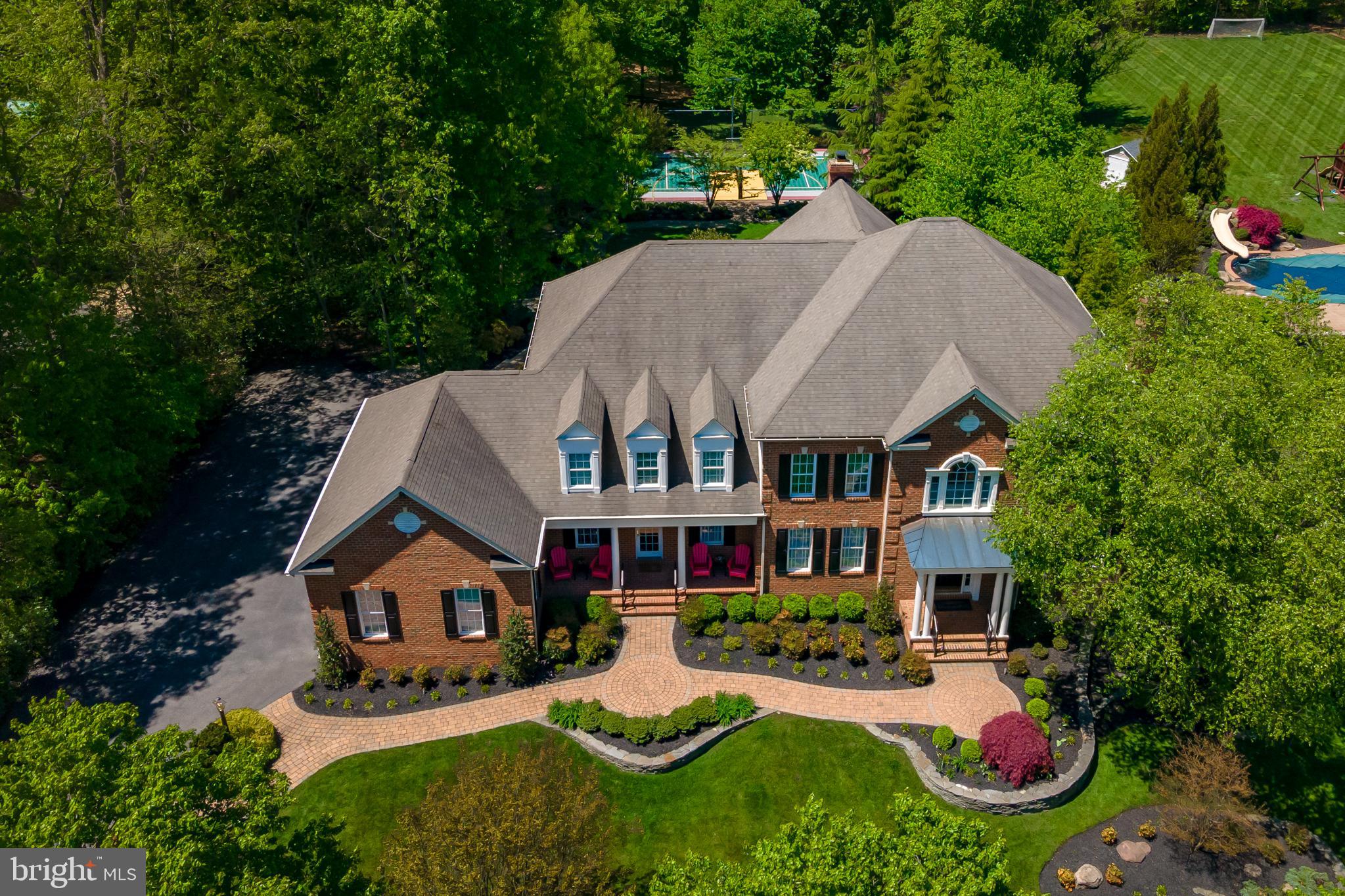 Interior pictures soon to follow!

Entertainers delight and a rare offering on one of the most beautiful streets in  Annapolis! An intimate neighbourhood of large homes with acreage close to horse stables and walking distance to blue ribbon Broadneck schools, walking paths, shops and Broadneck Park.  Incredibly private yet minutes to all the attractions of Annapolis. 1318 Windsor Ridge Lane is a spacious elegant home situated on almost 1.5 acres of extensively landscaped park like grounds ,including a lighted sports court for tennis/pickle ball and basketball!  About 1700 s/f of outdoor terrace including a swim spa and generous entertaining terrace.

This  extremely well designed and well built home by Koch builders has exceptional features both inside and out totalling over $650,000 in upgrades.  Over 7000 s/f of living space with solid  hardwood floors throughout.  6 generous en-suite bedrooms , expansive master bedroom suite with tray ceilings, large sitting area, generous walk-in closet, and spacious master bathroom.   Great sunroom, hardwood floors on main and second floor, perfect gourmet chef  kitchen with huge island,  GE Monogram 6 burner range, 2 ovens, an Advantium oven/microwave,  2 dishwashers ,warming drawer, and all stainless steal appliances.
Special features include : walkout basement with full entertaining area ,a projector television with sound system built in, pool/game room  along  with a  full kitchen, granite bar next to the double French doors going out to the garden, recently installed dance studio with special dance floor and mirrored wall, ballet bar that can be used as a yoga studio or exercise room, three generous storage areas.  Outside features include: sports court, swim pool /spa with light year around cover,  gorgeous hardscape, spacious dry storage under deck  with electricity for equipment and storage, 18 zone irrigation system, landscape lighting, fully enclosed yard with invisible fence, upgraded security system, generator, large decks, 3 car garage.  For anyone requiring more, there are plans for custom pool that can be easily added to the backyard.  Freshly painted and updated in the last year ,brand new air conditioner in 2021 servicing the upper level 4 en-suite bedrooms with UV air sanitizer.  This home is a rare gem and perfect for all ages providing countless hours of fun and entertaining!