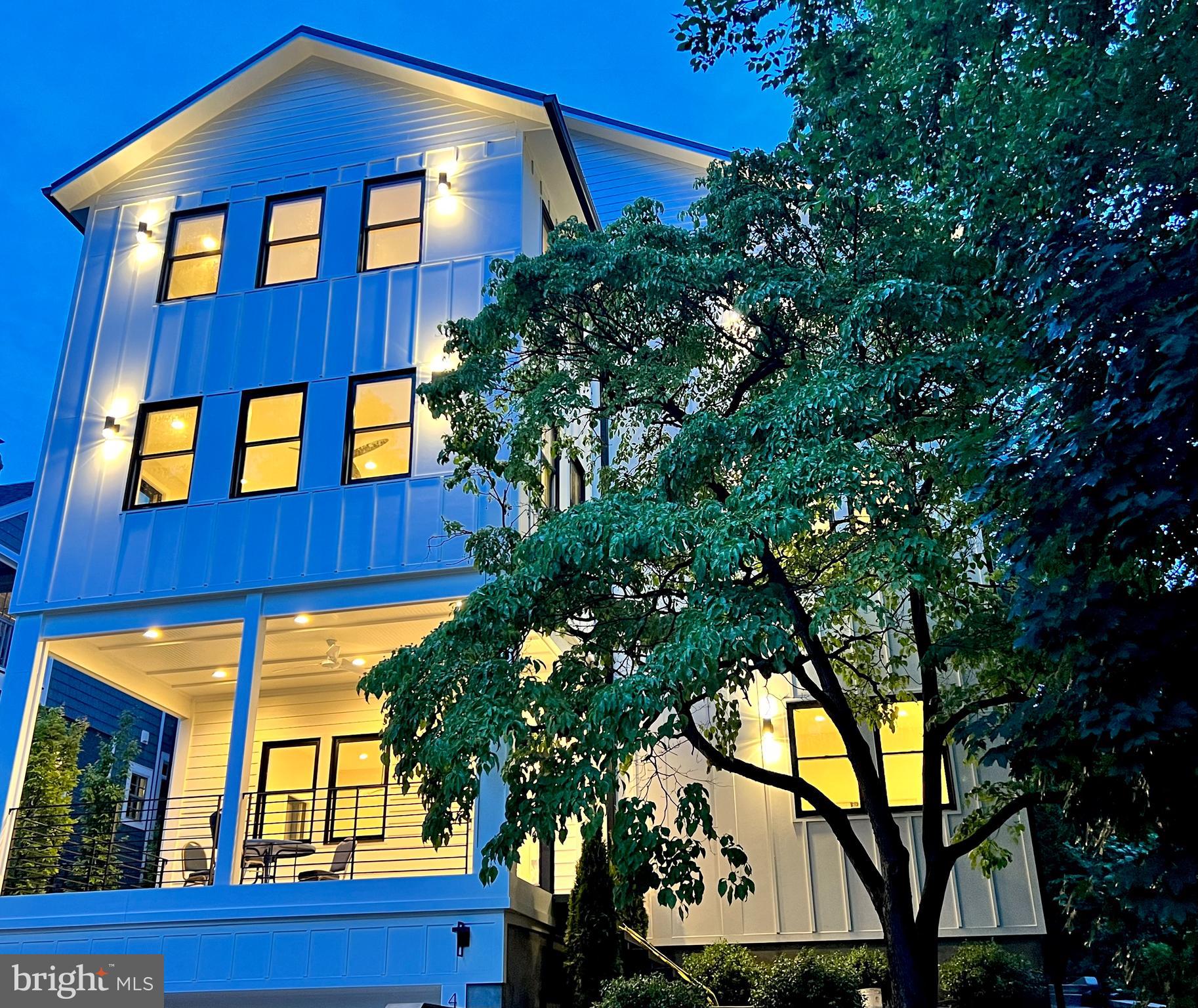Welcome home to this one-of-a-kind, spectacular modern-day oasis on one of Washington's most sought after streets. Custom designed an flawlessly executed, this stunning, new construction home offers the feel and enjoyment of suburban living, coupled with the conveniences of living in the heart of the city! Enjoy parkland views from your gracious front porch, or sit high atop the trees on this one-of-a-kind roof deck, and take in the amazing winter views of the Potomac River.  An entertainer's paradise, this showpiece offers a dramatic open floor plan, modern "floating" stairs, incredible 22-foot ceilings a custom, two story fireplace, and huge glass doors leading to your private patio. . For the Culinarian, the kitchen offers an oversized island with cascading quartz countertops, commercial-grade fridge, tons of counter space, commercial range, and an oversized pantry. Open to the great room, this space is a great space to spend time and entertain. It also opens up to the private patio space and secluded back yard. 
The main level also is completed by a wonderful office with white barn doors, and a formal dining/sitting room. 

The Primary suite is luxurious, offering all that could be desired, with its large bedroom and custom bathroom with gorgeous finishes!!! With the oversized, dual head shower, double sinks, and large vessel tub, you will feel like you are in a 5 star hotel, every day of the week! The suite is finished with an office/exercise  room and the walk-in closet is over the top, giving you the ability to customize it to your personal needs and taste. There is an optional washer/dryer hookup, as well!

The second level is complete with 4 generous bedrooms, 2 of which are en-suite, and 3 custom bathrooms. In addition, the laundry in on this level, making it accessible and convenient. 

The lower level offers lots of options, and is finished with its large open space, full wet bar, refrigerator, optional theater/game room, and a full bath. The home is also elevator-ready, and has a large garage with plenty of storage space. 

This unique, modern masterpiece puts you on the doorstep of the wonderful shops and restaurants that Palisades has to offer, as well as Fletcher's Boathouse, Palisades Battery Kemble Park, the Capital Crescent Trail, and so much more. Don't miss this Palisades Gem!!!