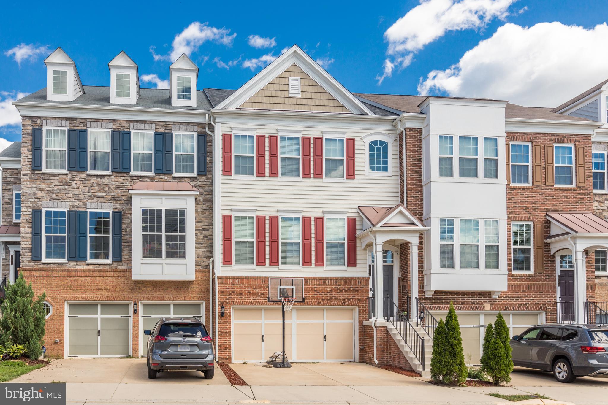 AVAILABLE February 1st   Spacious 4-bedroom, garage townhome.  Open floorplan main level with high ceilings throughout.  The fabulous kitchen has gas cooking, stainless appliances, and direct access to an oversized deck. This home is extended, providing extra space on all three levels.  Large walk-in closet, tray ceiling with fan, and a huge luxury bathroom in MBR. Bonus storage room in the 2-car garage.  Central location East Gate location with great amenities.