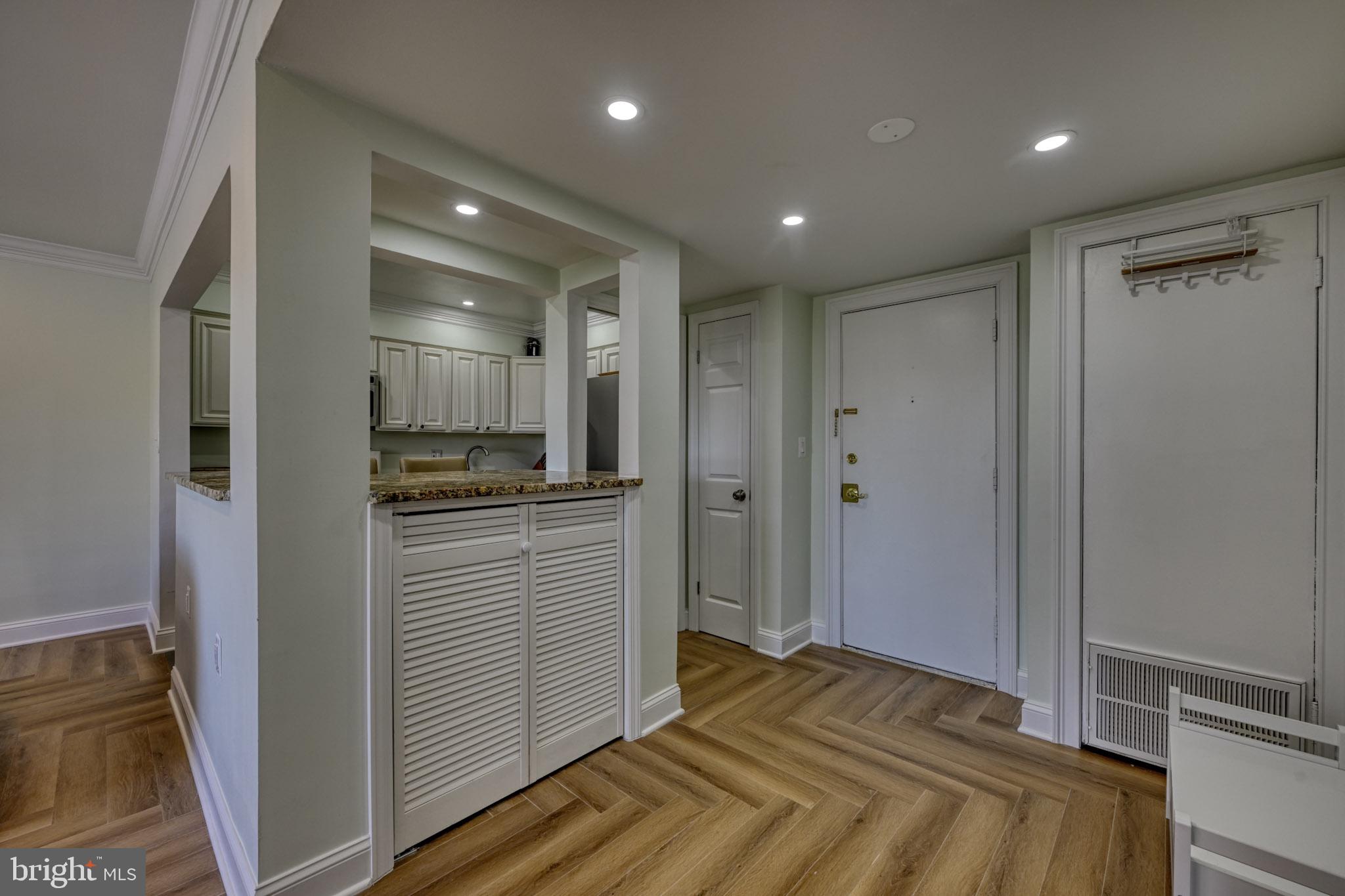 Beautifully renovated 2-bedroom, 1-bath condo located on the 4th floor in the highly sought-after community of The Village of Cross Keys. This light-filled residence has been thoughtfully updated throughout, offering a modern and inviting living space with an abundance of natural sunlight pouring through oversized windows.

The open and airy layout features stylish finishes, updated flooring, a renovated kitchen and bath, and spacious bedrooms designed for comfortable everyday living. Enjoy peaceful elevated views along with the convenience of low-maintenance condo living in one of Baltimore’s most desirable gated communities.

Residents of Cross Keys enjoy beautifully landscaped grounds, walkable streets, shopping, dining, and easy access to downtown Baltimore, Roland Park, and major commuter routes. A perfect blend of charm, convenience, and modern updates — this move-in ready condo is one you won’t want to miss.