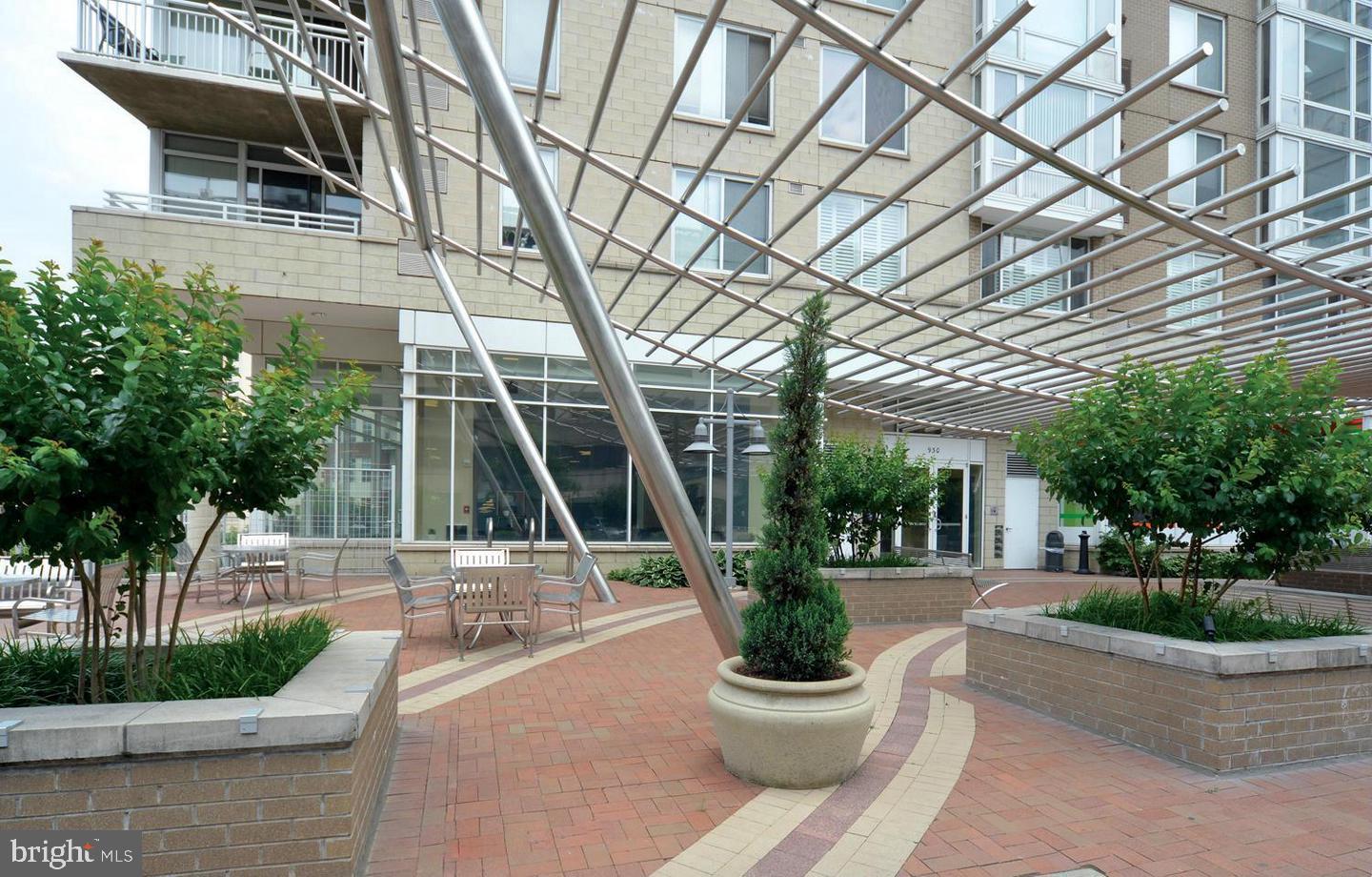 Open House canclled - under contract.  Welcome to the heart of Downtown Silver Spring. This 13th-floor unit offers breathtaking views from the balcony, creating an inviting space to relax and enjoy the cityscape. With a garage parking space and FHA approval, convenience and accessibility are at the forefront. The pet-friendly building features a range of amenities, including a fitness room and a party room in the lobby, outdoor tables/seating, a bike rack, on-site management, and a welcoming community atmosphere. Step inside to discover a spacious living area filled with natural light from the floor-to-ceiling panoramic windows. The gourmet kitchen boasts granite countertops, a breakfast bar, and an open layout that seamlessly connects to the living and dining areas. Hardwood floors run throughout the living area and bedrooms, creating a stylish and low-maintenance living space. The Crescent Condominium's prime location in vibrant Downtown Silver Spring offers an array of dining and shopping options, including Whole Foods, &Pizza, BurgerFi, and El Sapo, all just steps away. Additionally, the Silver Spring Metro, Safeway, Giant, and more are within a few blocks, making daily errands and commutes a breeze. The University of Maryland and Metro bus stop are conveniently located right in front of the building. Don't miss the opportunity to make this vibrant and convenient urban oasis your new home.