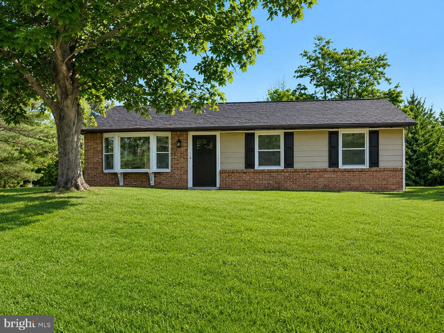 🔥 NEW LISTING – 858 Star Court, Union Bridge, MD
A charming rancher on a quiet cul de sac with a fully finished walkout basement and a fantastic, fenced backyard.
Nestled at the end of a peaceful cul de sac, this well maintained 3-bedroom, 1.5 bath rancher offers the perfect blend of comfort, usable space, and small-town living. Set on 0.66 acres, the property features a partially fenced rear yard, mature trees, a deck, patio, fire pit area, and a large shed/storage building—ideal for hobbies, tools, or play equipment.
Inside, the main level offers a bright traditional layout with wood floors, fresh paint, and a welcoming living room anchored by a brick fireplace with wood stove insert and mantel.  The eat in kitchen includes stainless appliances, pantry storage, and easy flow into the dining area.
All three bedrooms are located on the main level, along with a nicely updated full bath and convenient hallway-built ins.
The fully finished lower level expands your living space with a large family room, bar area, half bath, laundry, and a lower-level bedroom—perfect for guests, a private retreat, or multi-generational living. Walkout access leads directly to the patio and backyard, making indoor/outdoor living effortless.
With central A/C, multiple heating options (heat pump + wood stove), public water, public sewer, and a paved driveway with parking for four, this home checks all the boxes for comfort and practicality.
Located in Carroll County with easy access to parks, schools, and commuter routes, 858 Star Court delivers a solid combination of space, convenience, and value.