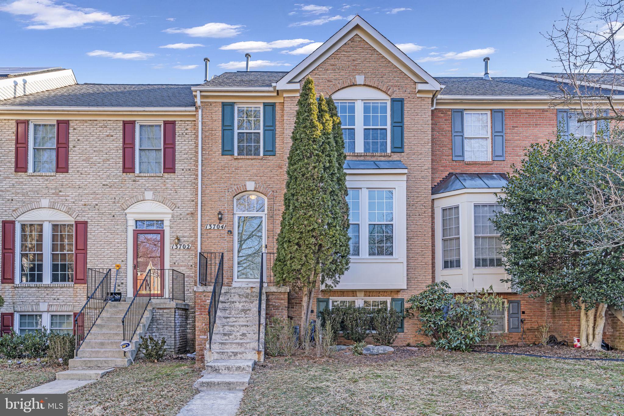 Bright and elegant brick-front townhome featuring 4 bedrooms, 2 full and 2 half renovated baths in the highly desired Willows of Potomac community. The main level boasts beautiful hardwood flooring, while brand-new carpeting enhances the upper and lower levels. The spacious living and dining area offers seamless access to large deck, perfect for outdoor relaxation. The upgraded gourmet kitchen is equipped with a breakfast island, granite countertops, and stainless-steel appliances. Upstairs, the expansive primary suite is accompanied by two additional bedrooms and a dedicated laundry room. The walk-out basement provides extra living space with a bedroom, recreation area, half bath and cozy fireplace. Backyard patio was built in 2021.  HVAC was replaced in 2021.  This home includes two assigned parking spaces (114 & 115). Residents enjoy top-notch community amenities such as a playground, clubhouse, swimming pool, tennis court, and basketball court. Conveniently located near Route 28 and I-270.  Wootton High School, Robert Frost Middle School, and Lakewood Elementary School.