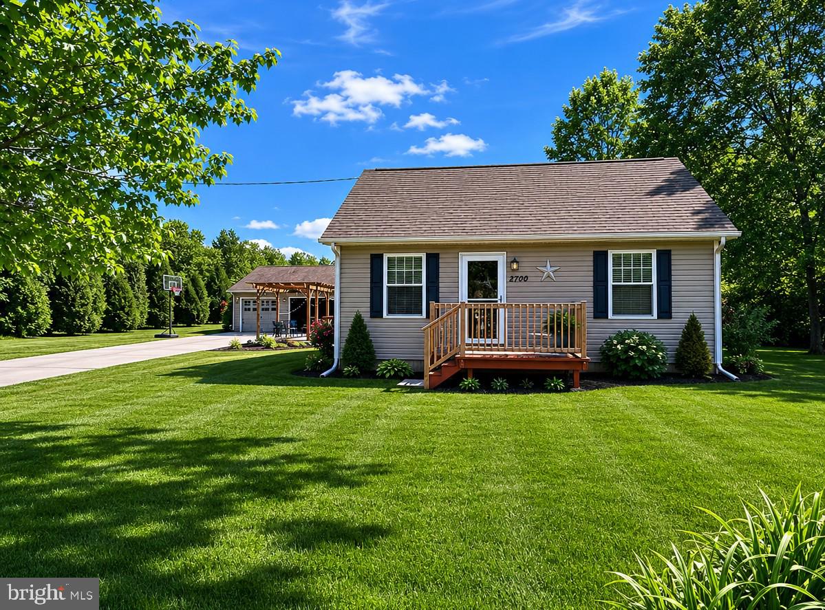 Nestled on 2 beautiful acres in the heart of Spotsylvania County, this charming country retreat offers the perfect combination of peaceful living, functional space, and timeless character. With nearly 1,300 square feet of inviting living space, this delightful home welcomes you with warmth, comfort, and the kind of setting that instantly feels like home.

Surrounded by mature trees and open outdoor space, 12700 Post Oak Road provides the privacy and tranquility so many buyers are searching for. Inside, you’ll find cozy yet functional living areas filled with natural light and charming details throughout. The bathroom features heated floors for an added touch of everyday luxury, while the electric heat-pump system provides year-round comfort and efficiency.

Step outside and discover everything this property has to offer beyond the home itself. A massive 1,000 +/- square foot detached two-car garage provides endless possibilities with additional space ideal for a home office, studio, workshop, hobby area, or extra storage. The rear garage entrance adds convenience and flexibility for equipment, projects, or recreational vehicles. Two additional storage sheds (12x16 and 10x12) further enhance the property’s versatility and functionality.

Garden enthusiasts and outdoor lovers will especially appreciate the property’s two separate wells — a 54’ bore well dedicated for gardening and outdoor use, along with a 124’ drilled well servicing the home. Whether you dream of gardening, homesteading, creating outdoor entertaining spaces, or simply enjoying peaceful country living, this property offers the room and resources to make it happen.

Relax on the deck, enjoy the quiet sounds of nature, and take in the beauty of this serene countryside setting — all while remaining conveniently located to shopping, dining, and commuter routes. Rarely does a property combine charm, acreage, utility, and opportunity quite like this one.