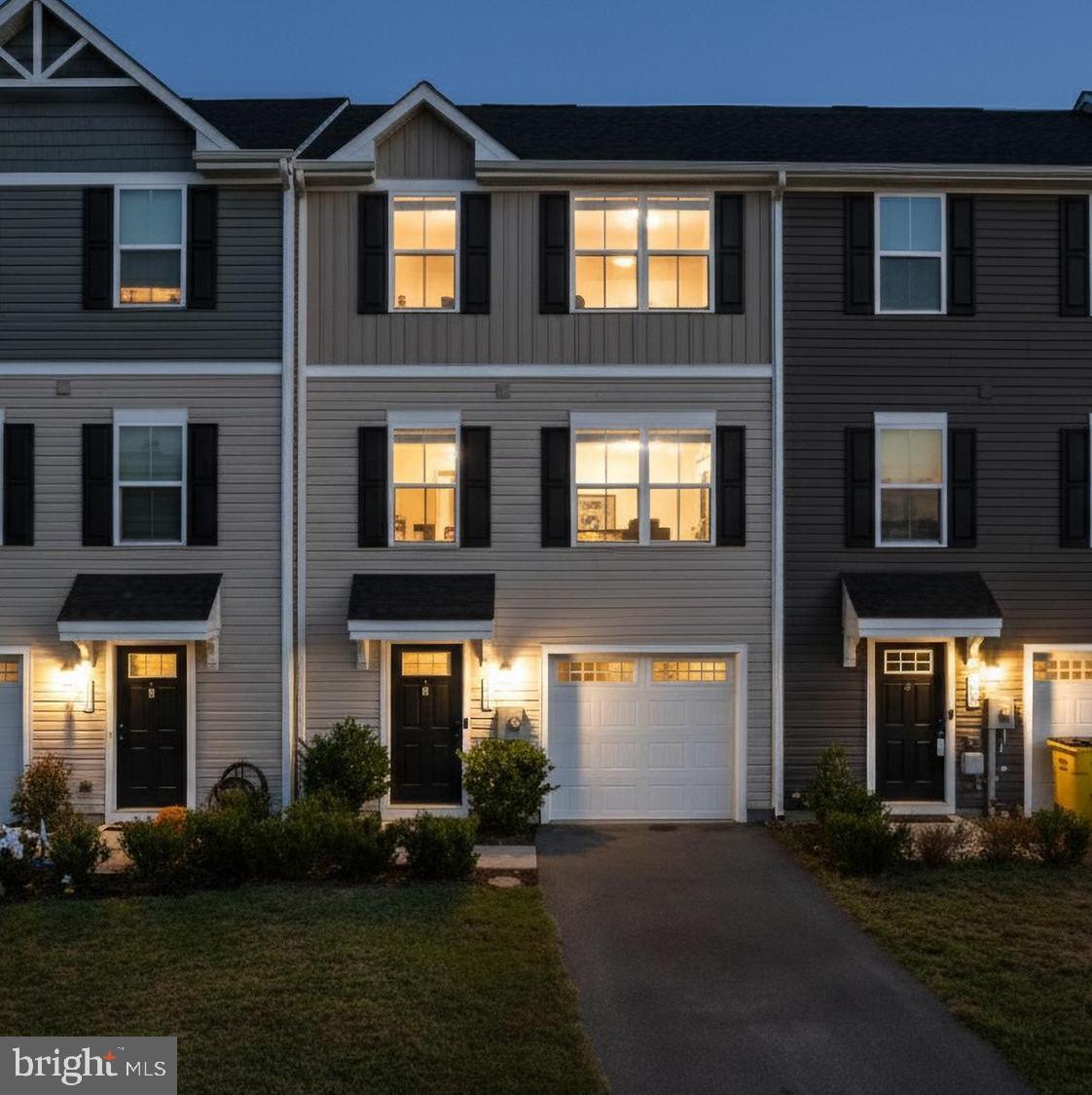 You have FOUND the ONE! This Spacious 3-bedroom townhome, where modern living space is designed for both comfort and entertaining. The journey begins on the entry level, where a versatile recreation room (or your perfect home office) and a handy coat closet greet you. Head upstairs to the heart of the home—an open and airy main level. Here, a well-appointed kitchen opens to a dining area and an oversized, sun-filled family room, creating an ideal flow for daily life and hosting guests. Retreat to the upper level, where three generous bedrooms await. The owner's suite is a true haven, featuring a private bath and a large walk-in closet. For ultimate convenience, an included washer and dryer are located just steps away. Step outside to discover a welcoming community with sidewalk-lined streets, playgrounds, picnic areas and pavilion, walking/jogging/bike trails and so much more. Conveniently located to transportation routes, shops, history, hospitality, hospitals and anything you could need! This isn't just a house—it's a lifestyle within reach. Schedule your private tour Today!