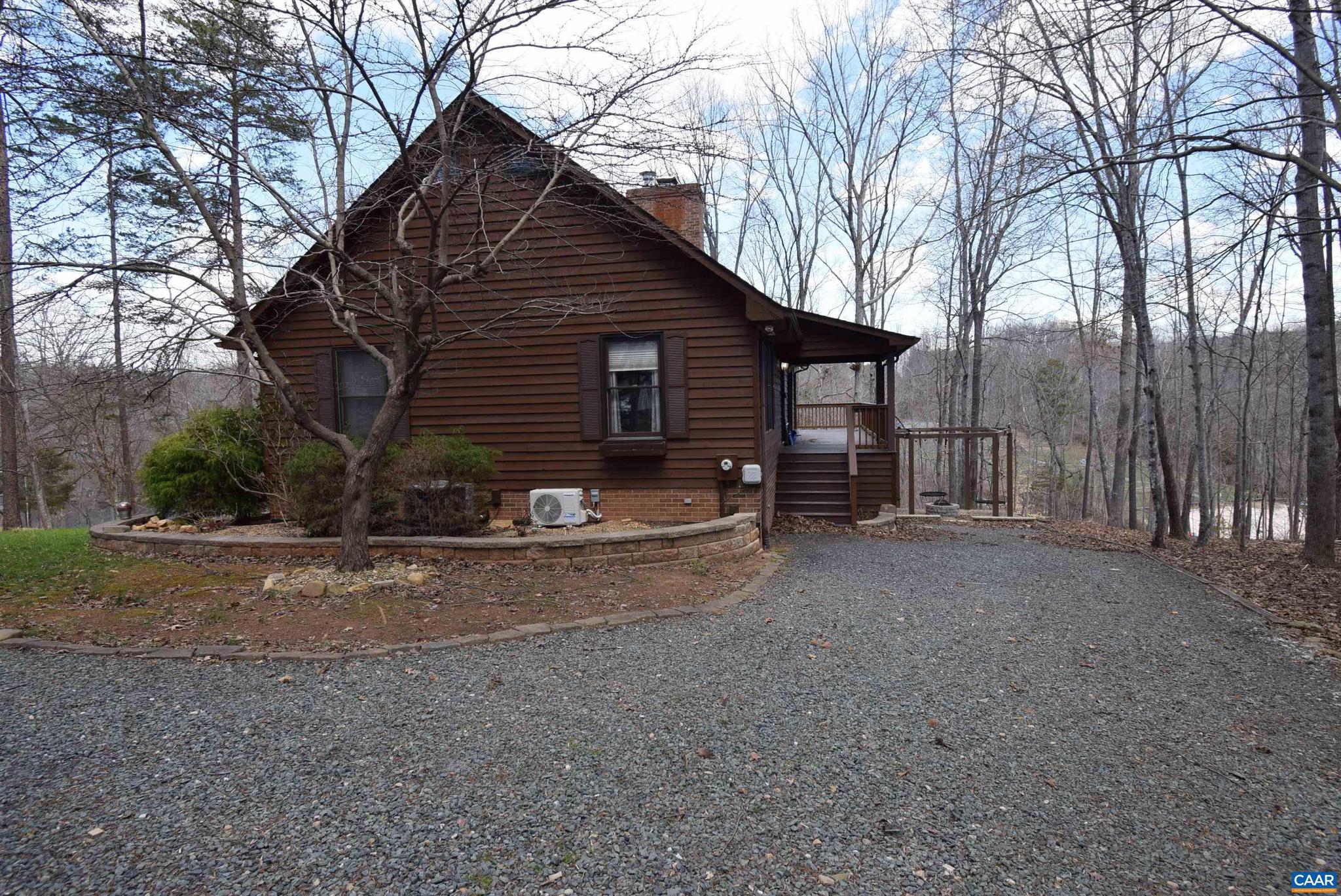 Waterfront A-frame at end of a cul-de-sac with large wrap-around deck.  Large, light-filled great room with 18' cathedral ceilings, a wall of windows looking out onto the lake, and a wood burning fireplace.  Updated kitchen with SS appliances, 2 beds/1 bath on main level w/loft bedroom and full bath up. Dining room table stays.  Lower level not included in rental. THIS PROPERTY IS MANAGED BY MONTICELLO PROPERTIES AND ALL INQUIRIES/APPLICATIONS MUST COME THROUGH THEM. We do ask for the following requirements from all our tenants: (1) A credit score of at least 640 (no accounts in collections), (2) verifiable employment and/ or the combined income of lease holders must be 3x the monthly rental amount,(3) positive landlord references (no prior negative tenant/landlord history, example; eviction or court cases with landlord) or a positive mortgage history. All applicants are subject to a state and federal criminal background check.